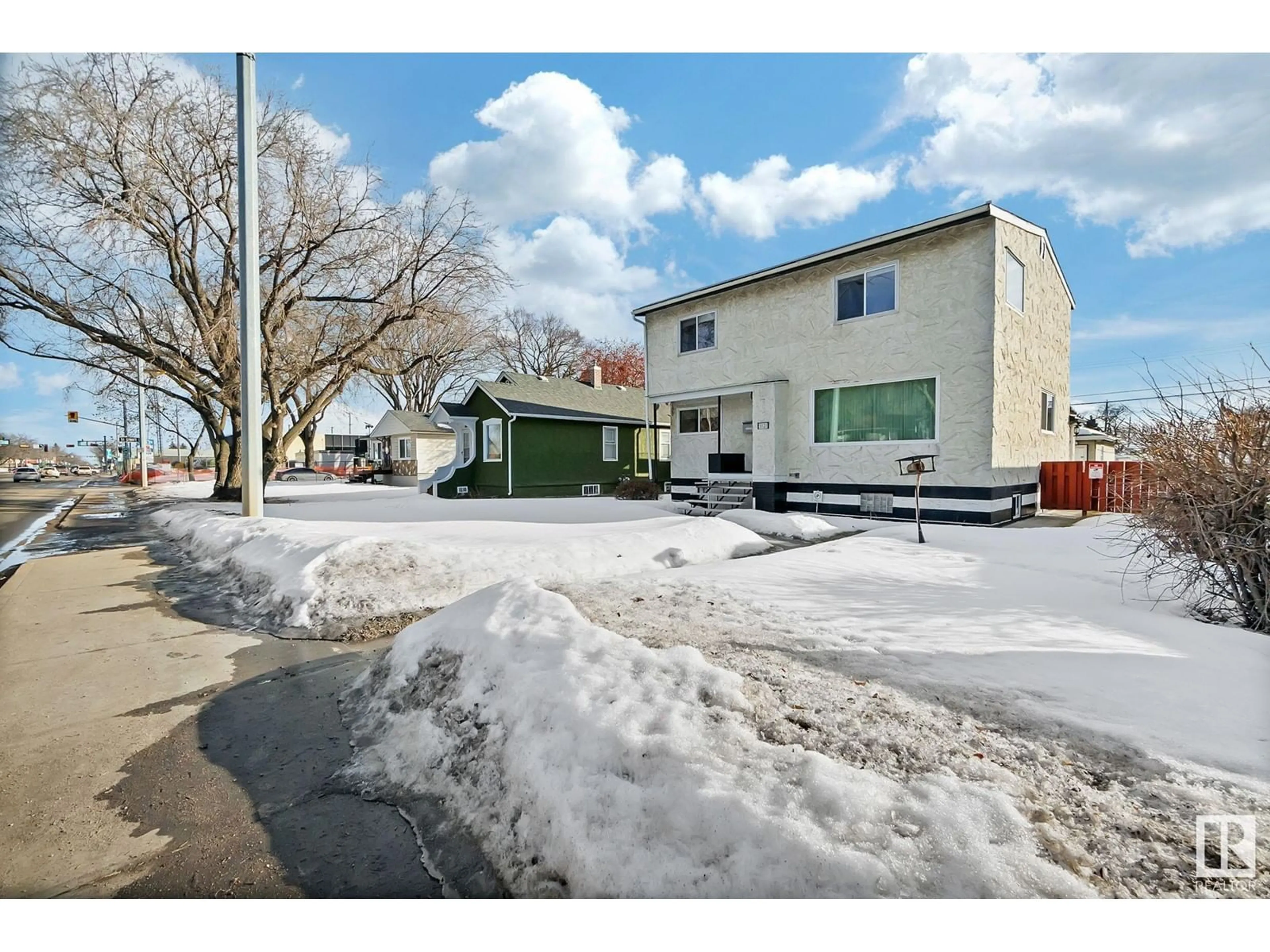 A pic from outside/outdoor area/front of a property/back of a property/a pic from drone, street for 5121 118 AV NW, Edmonton Alberta T5W1C1