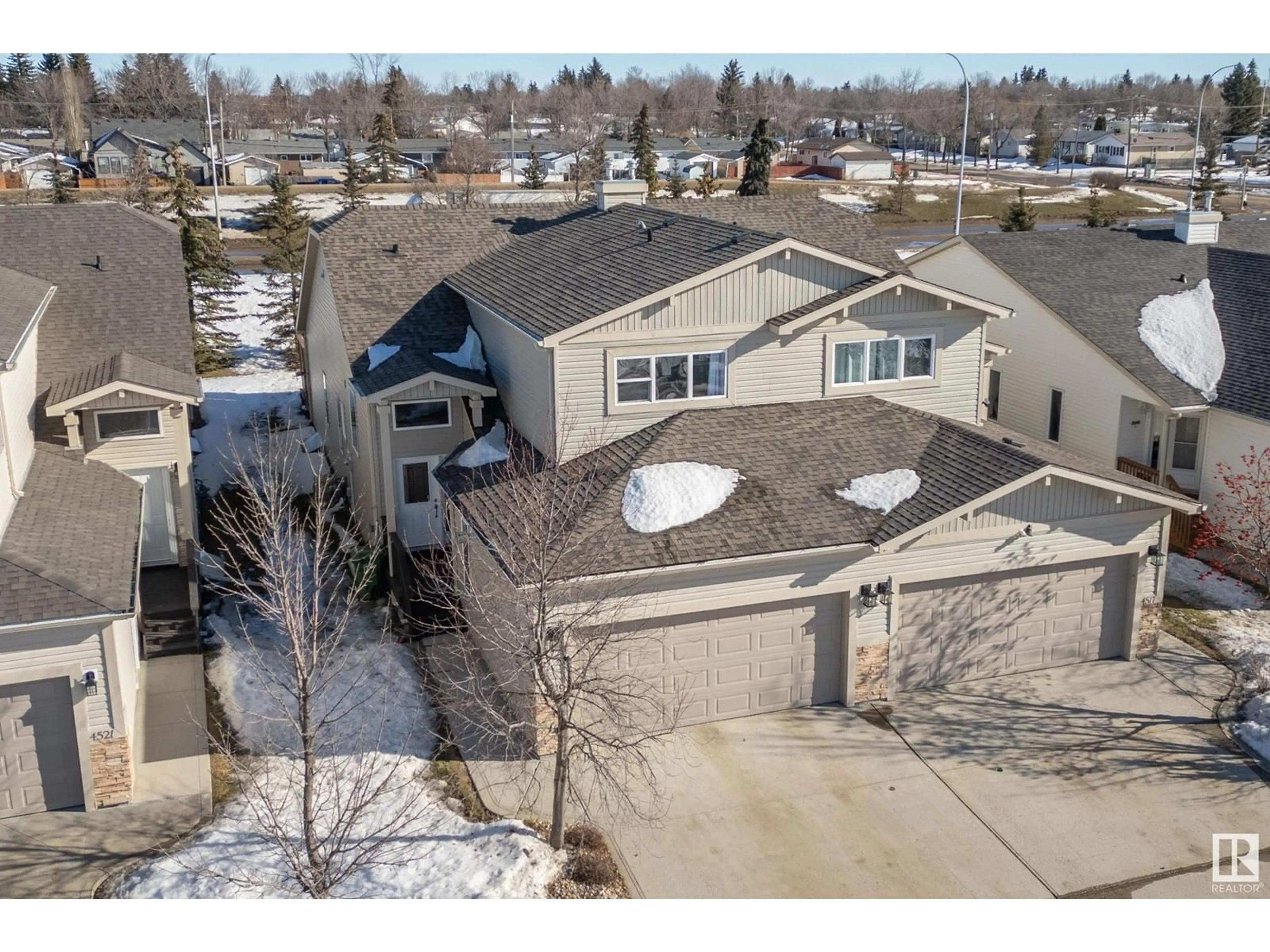 A pic from outside/outdoor area/front of a property/back of a property/a pic from drone, street for 4519 69 ST, Camrose Alberta T4V5B3