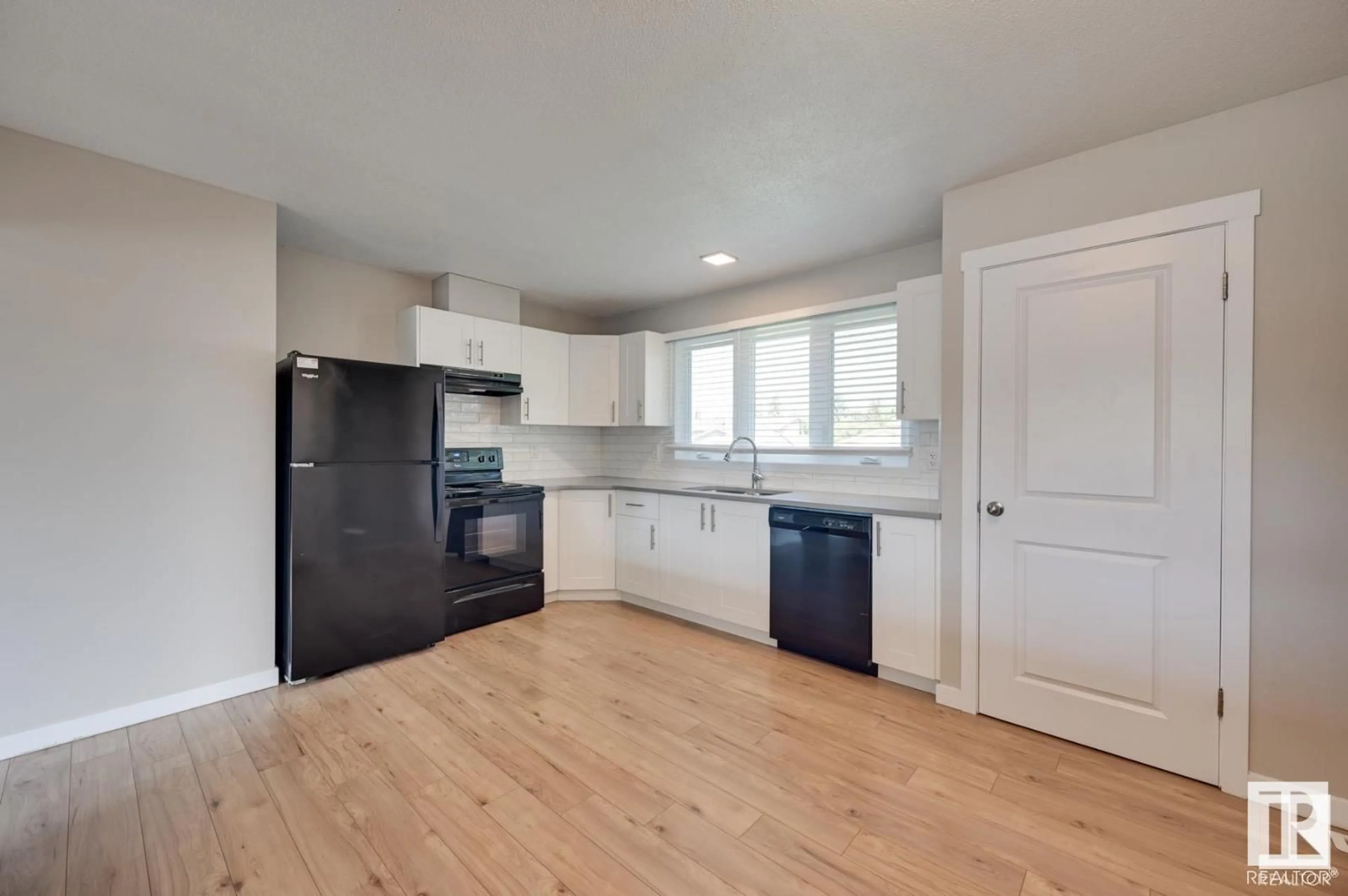 Open concept kitchen, unknown for 7408 149A AV NW, Edmonton Alberta T5C2W6