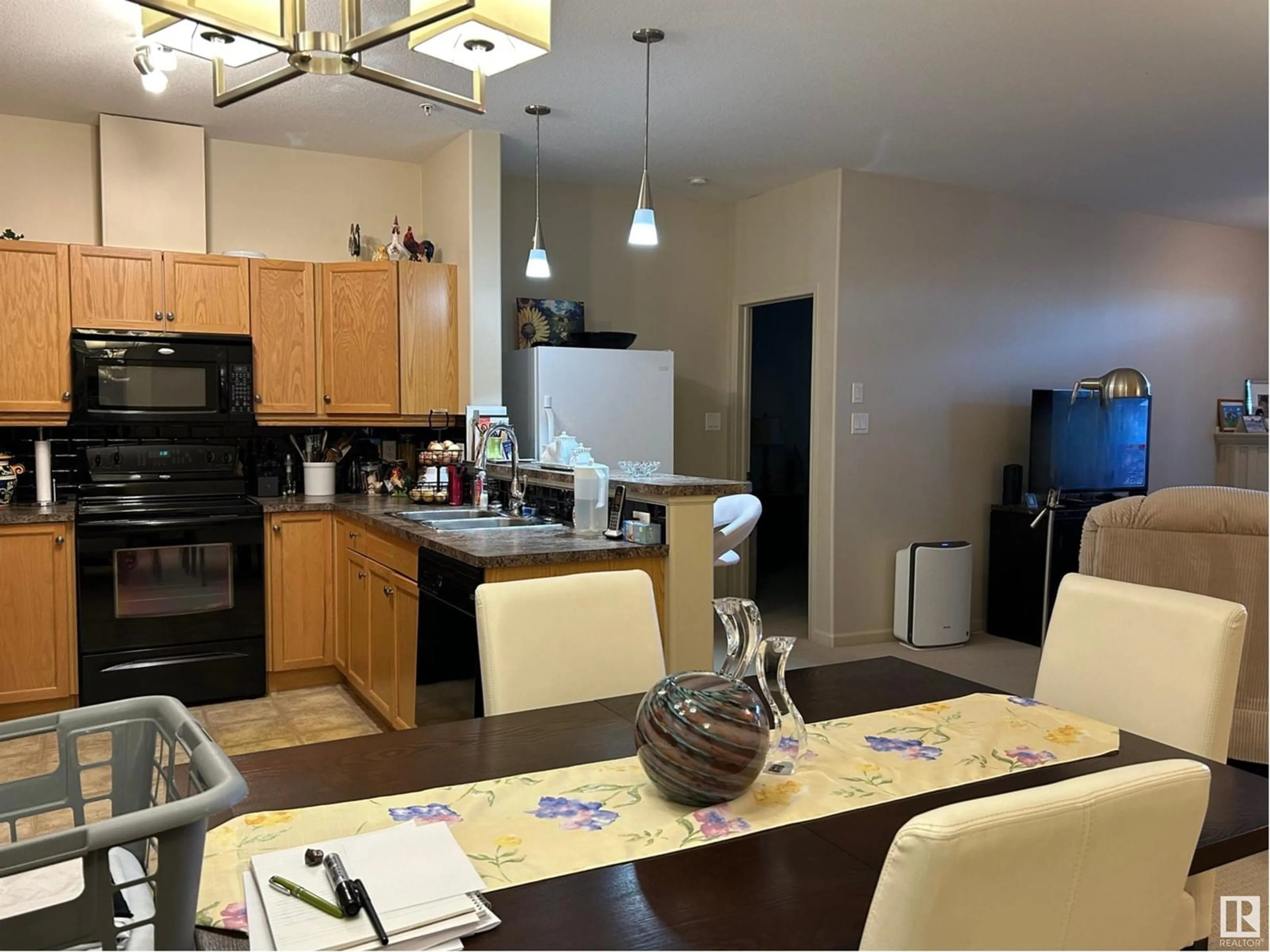 Open concept kitchen, unknown for #125 2503 HANNA CR NW, Edmonton Alberta T6R0H1