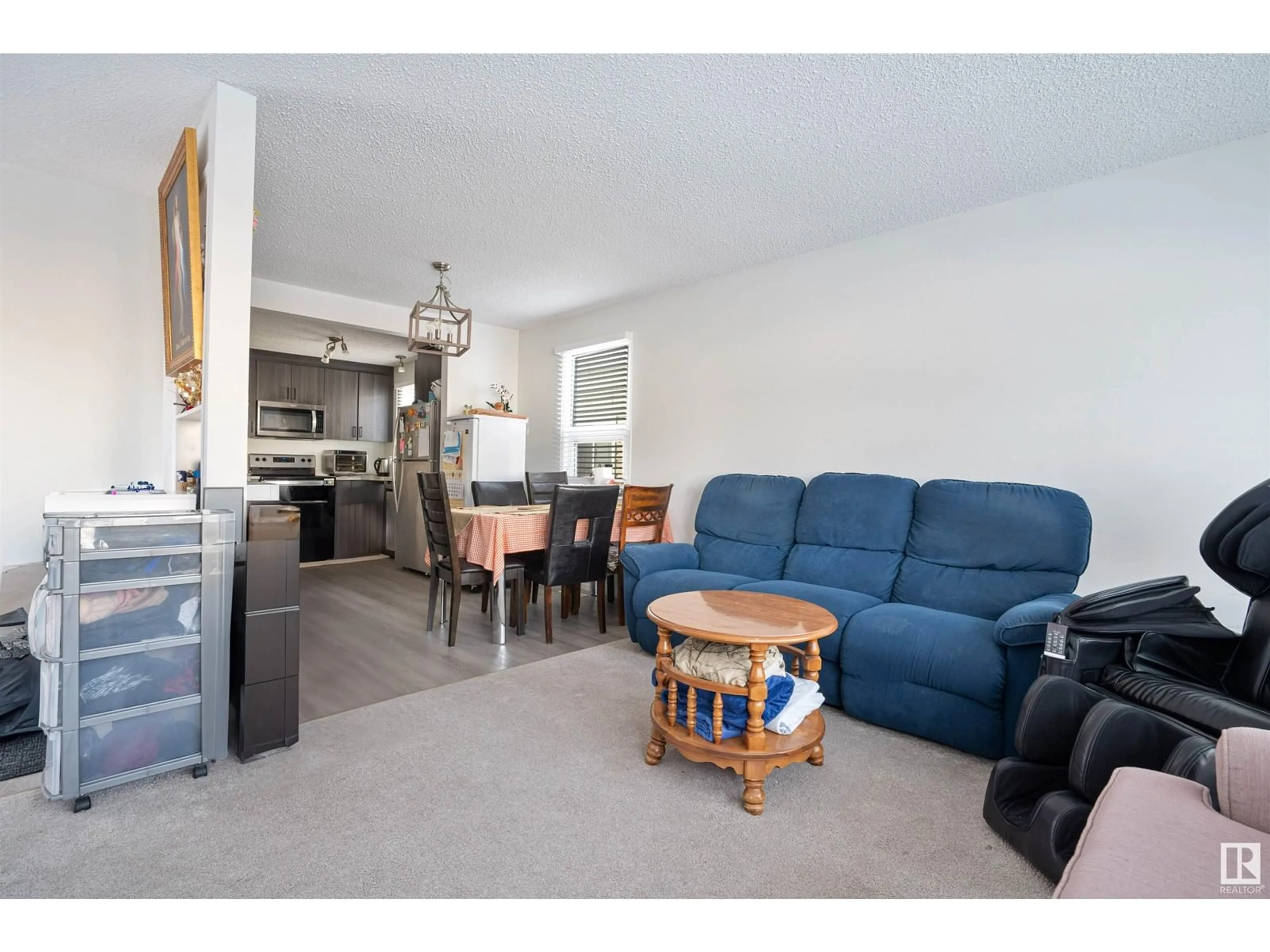 Living room with furniture, unknown for 1812 36 ST NW, Edmonton Alberta T6L3G5