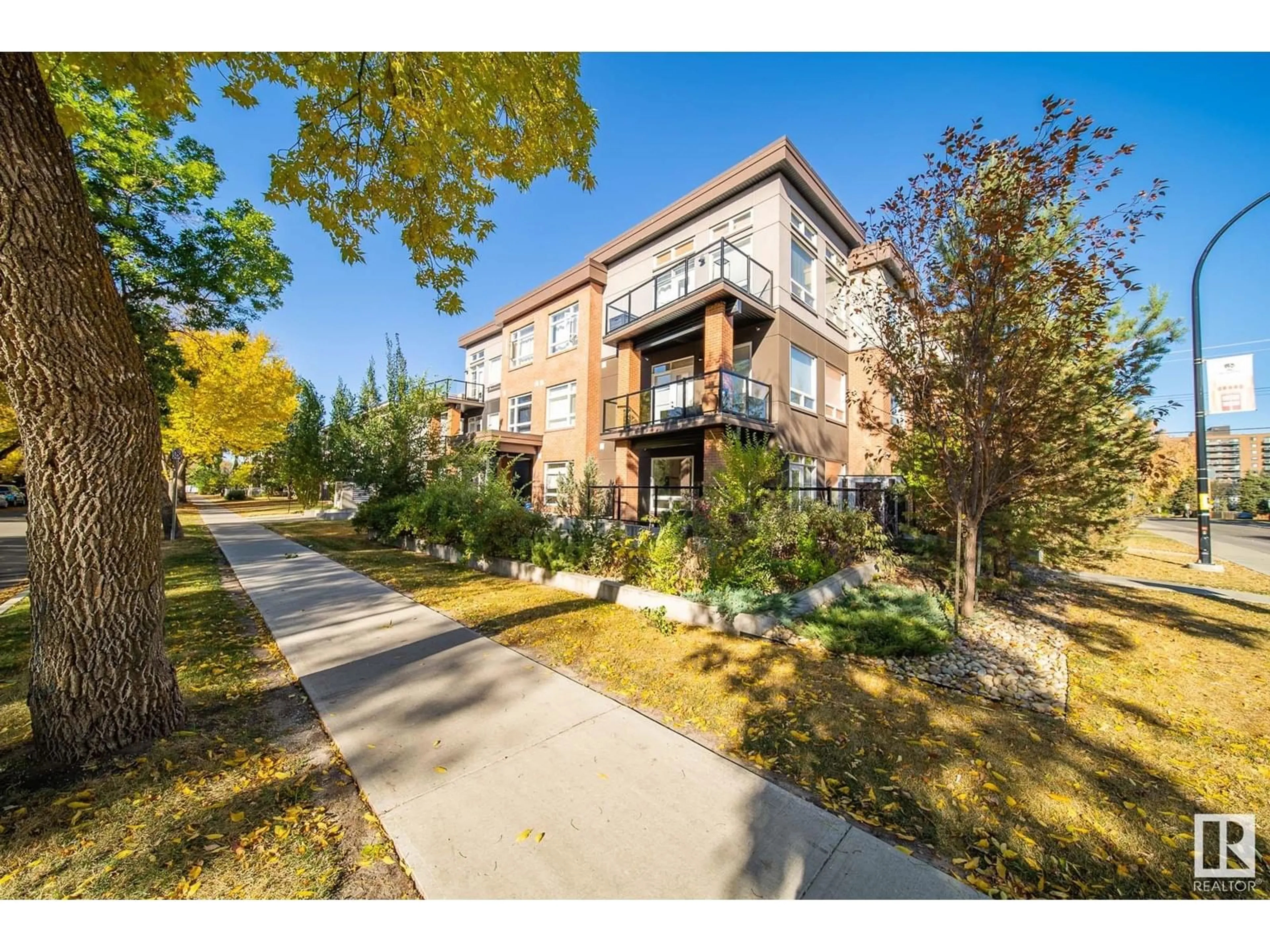 A pic from outside/outdoor area/front of a property/back of a property/a pic from drone, street for #205 10606 84 AV NW, Edmonton Alberta T6E2H6