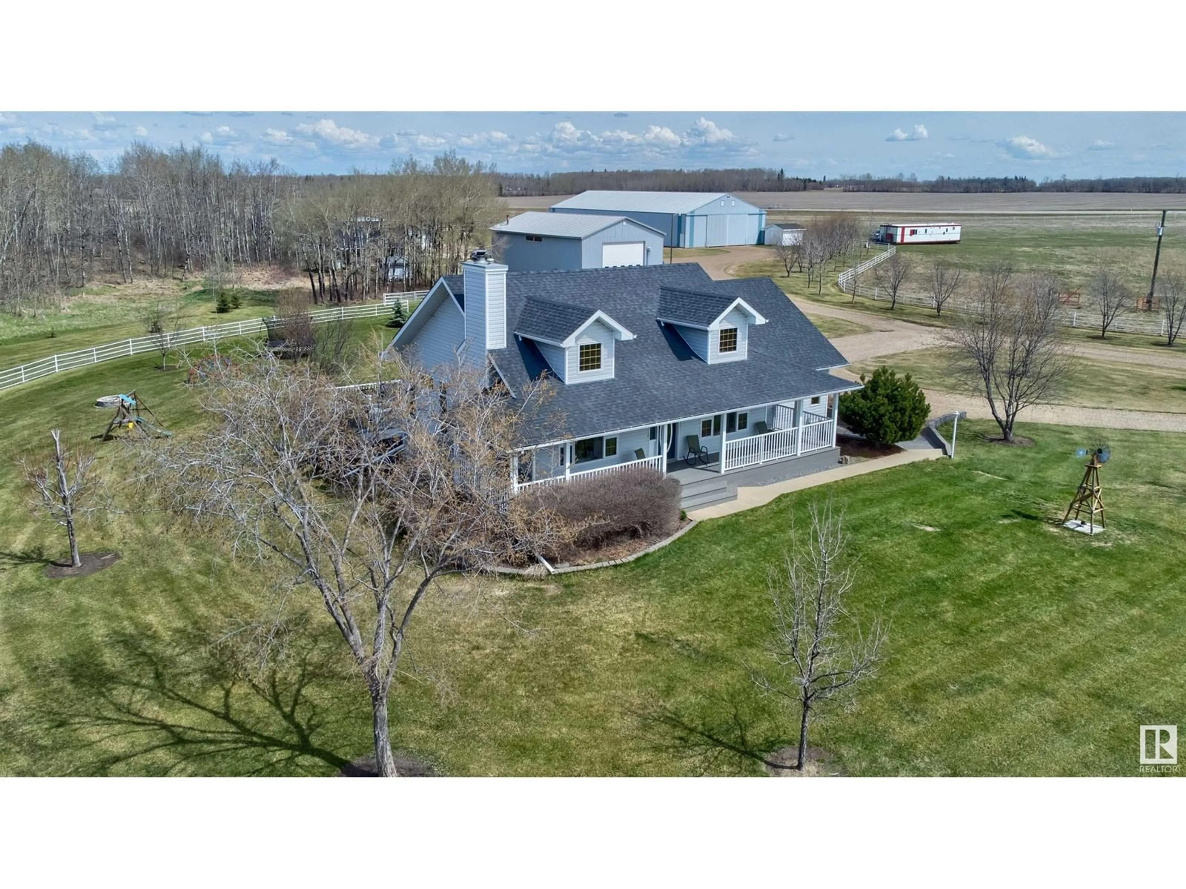 A pic from outside/outdoor area/front of a property/back of a property/a pic from drone, water/lake/river/ocean view for 26332 TWP RD 590, Rural Westlock County Alberta T0G1W0