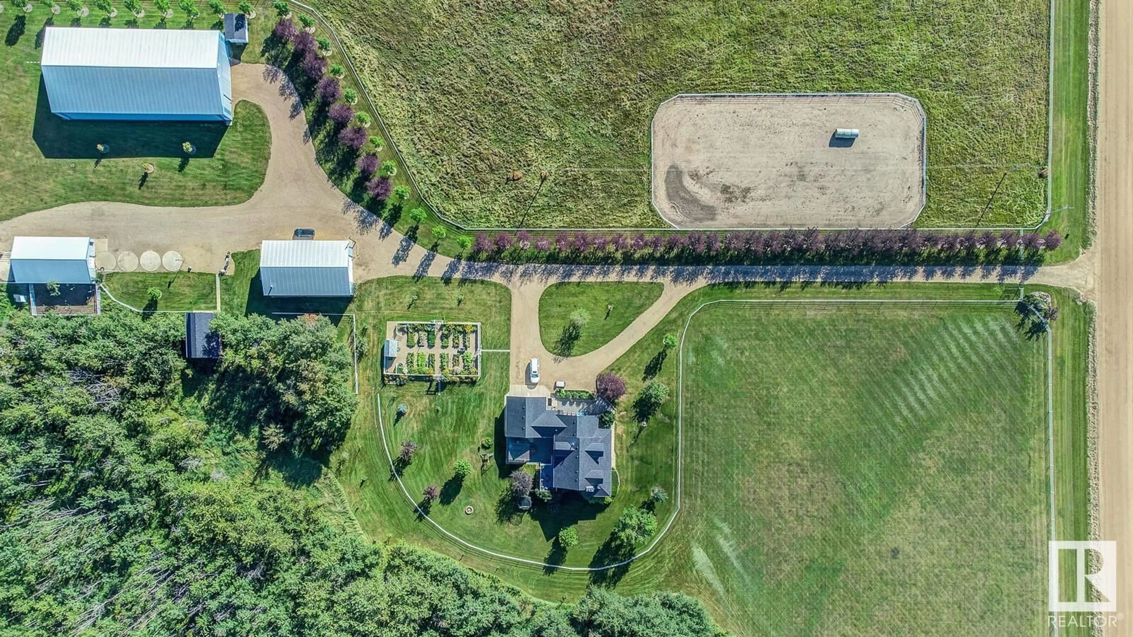 A pic from outside/outdoor area/front of a property/back of a property/a pic from drone, street for 26332 TWP RD 590, Rural Westlock County Alberta T0G1W0