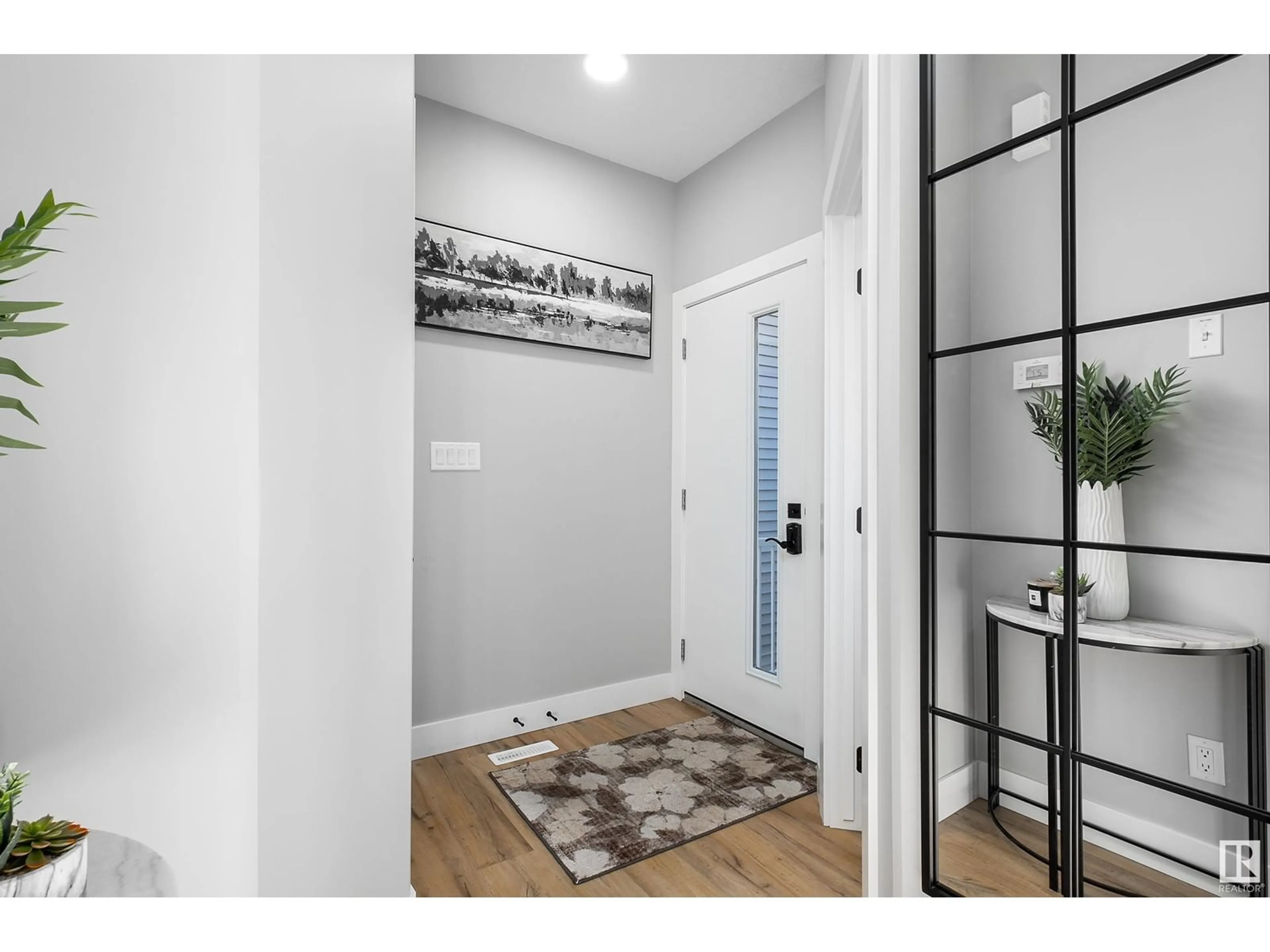 Indoor entryway for 1077 Eaton RD NW, Edmonton Alberta T6M1M9