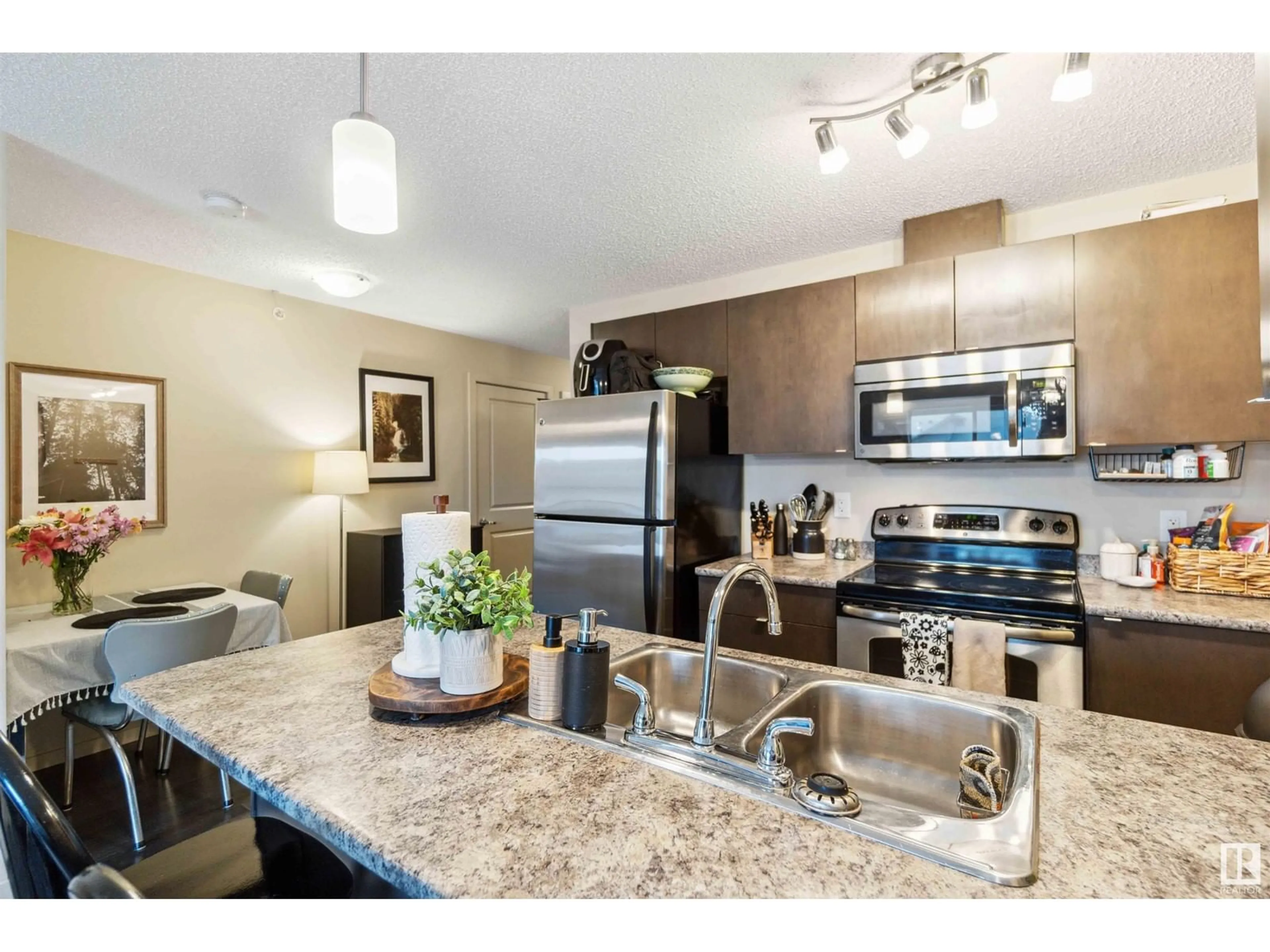 Open concept kitchen, unknown for #409 3353 16A AV NW, Edmonton Alberta T6T0V4