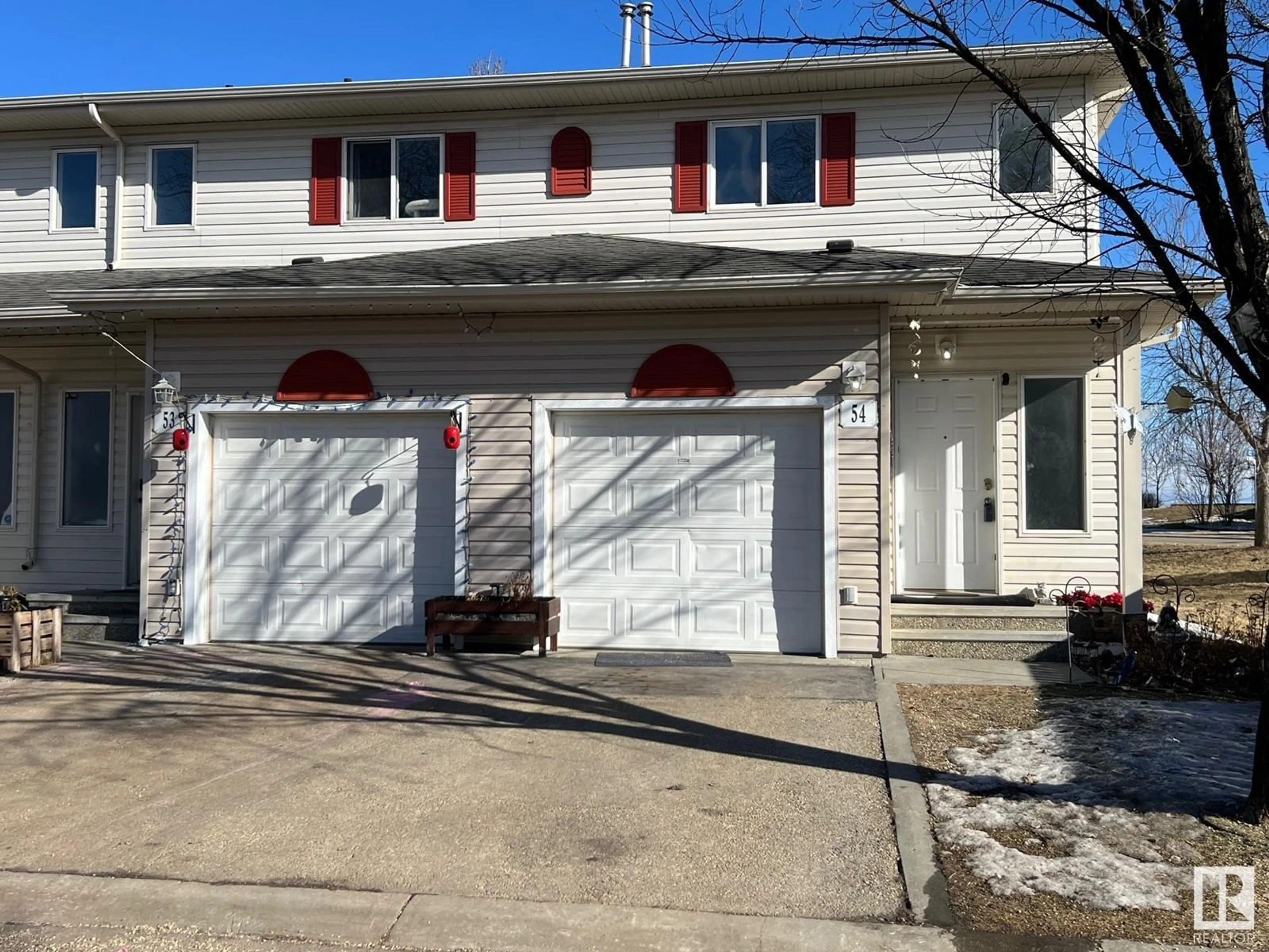 Home with vinyl exterior material, street for #54 451 HYNDMAN CR NW, Edmonton Alberta T5A5J3