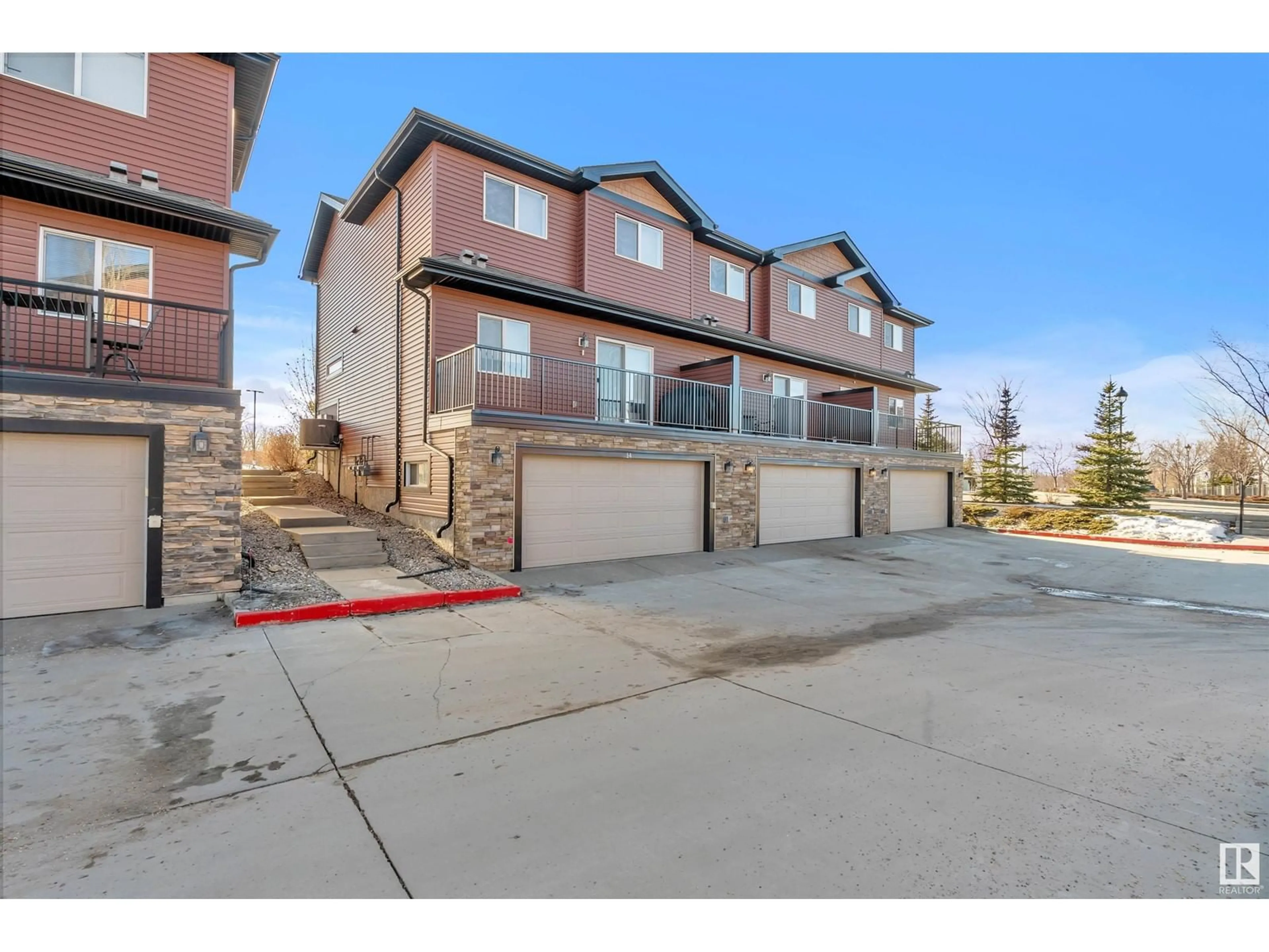 A pic from outside/outdoor area/front of a property/back of a property/a pic from drone, street for #14 301 PALISADES WY, Sherwood Park Alberta T8H0T4