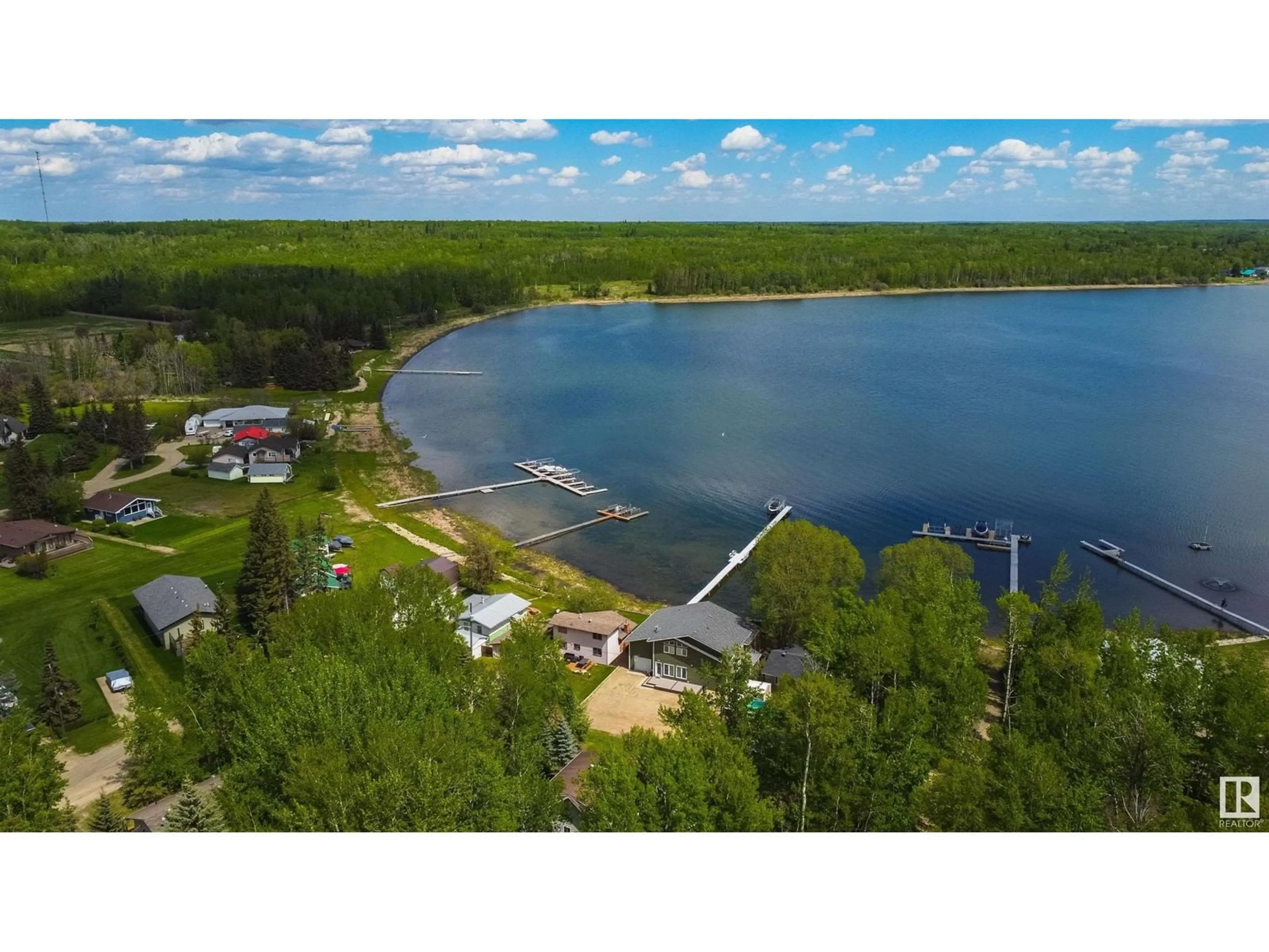 A pic from outside/outdoor area/front of a property/back of a property/a pic from drone, water/lake/river/ocean view for 329 3 ST, Rural Lac Ste. Anne County Alberta T0E1A0