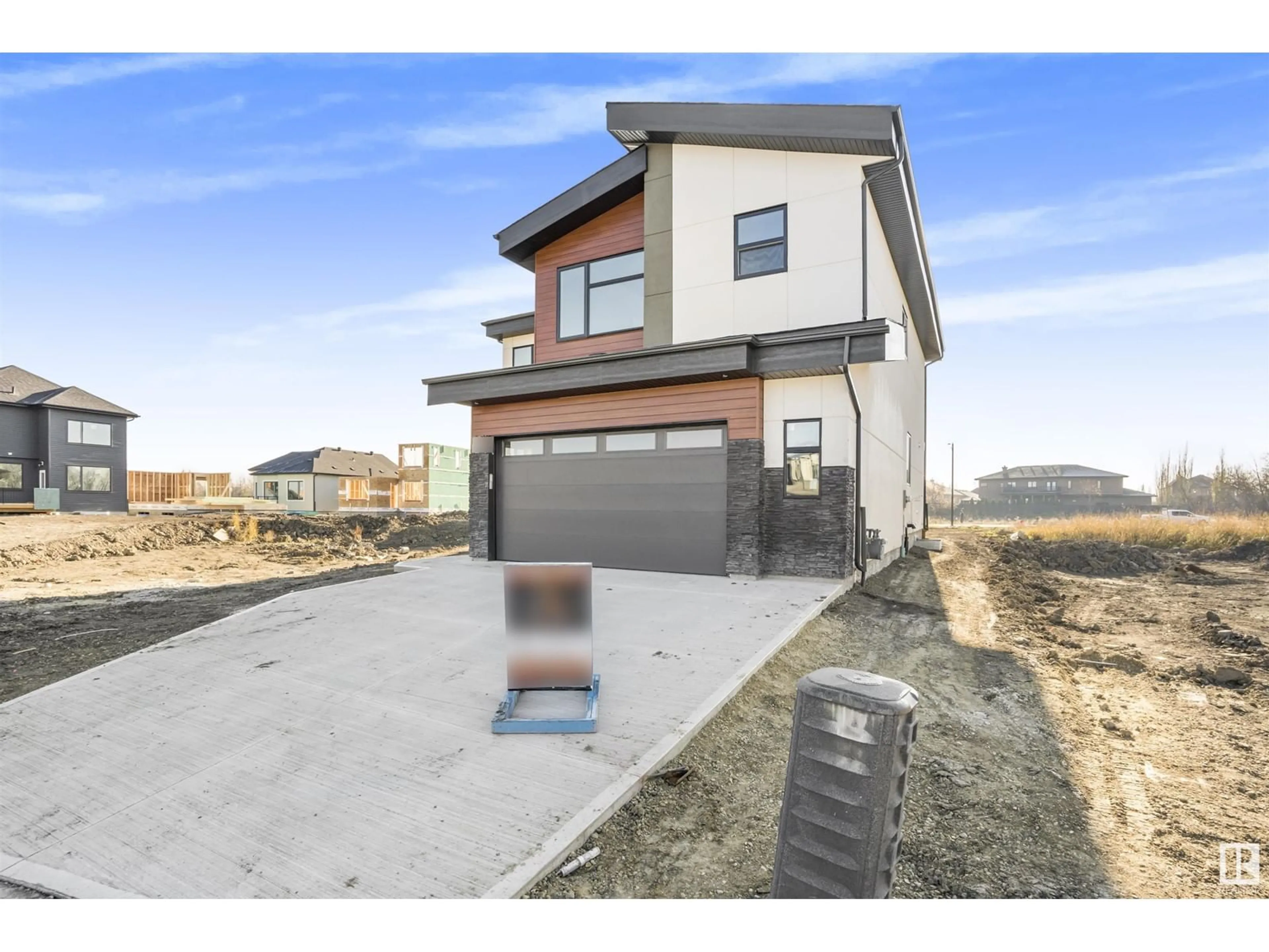 Home with brick exterior material, street for 235 166 AV NE, Edmonton Alberta T5Y4J2