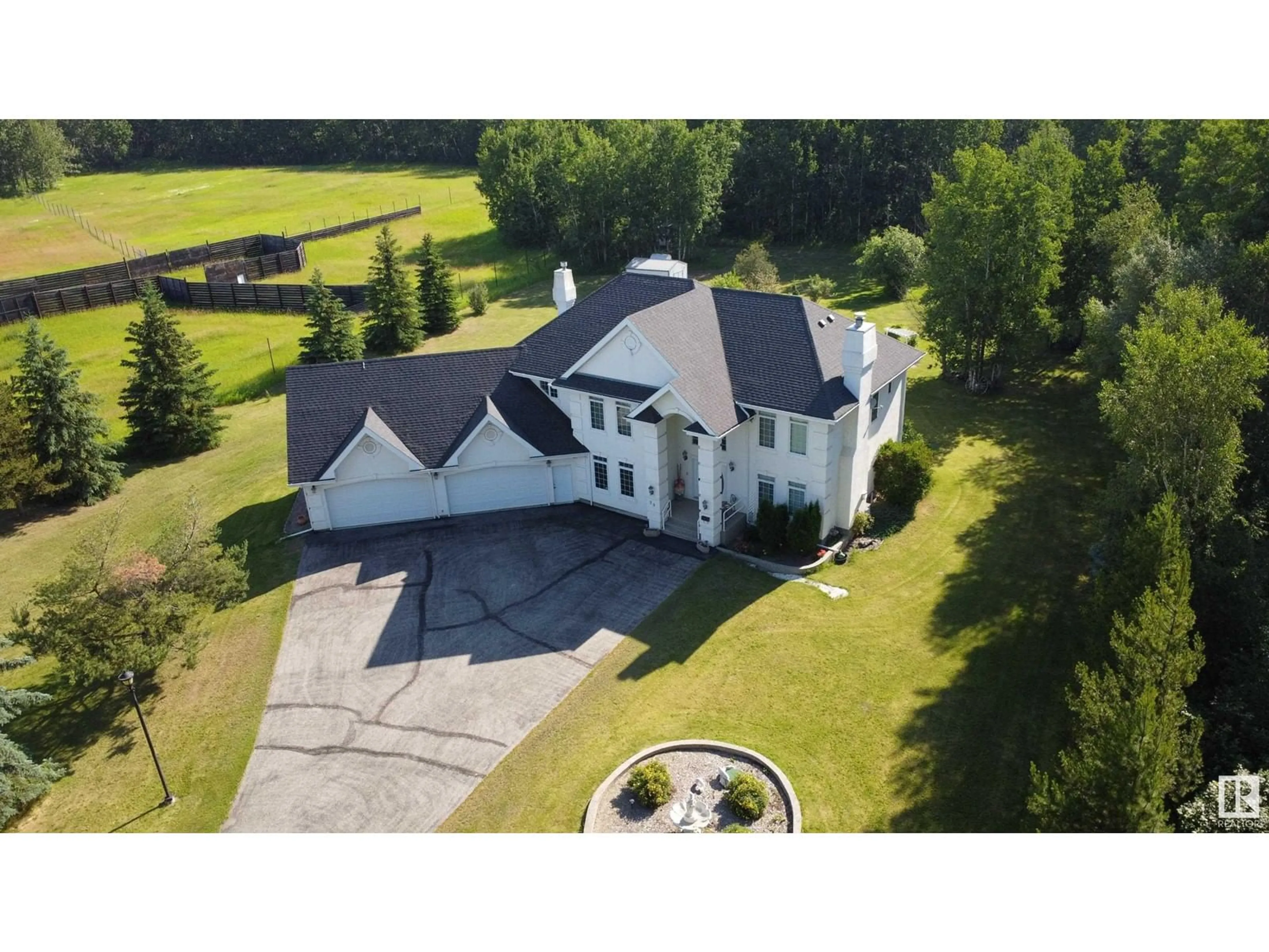 A pic from outside/outdoor area/front of a property/back of a property/a pic from drone, unknown for A - 26020 TWP RD 511, Rural Parkland County Alberta T7Y1B2