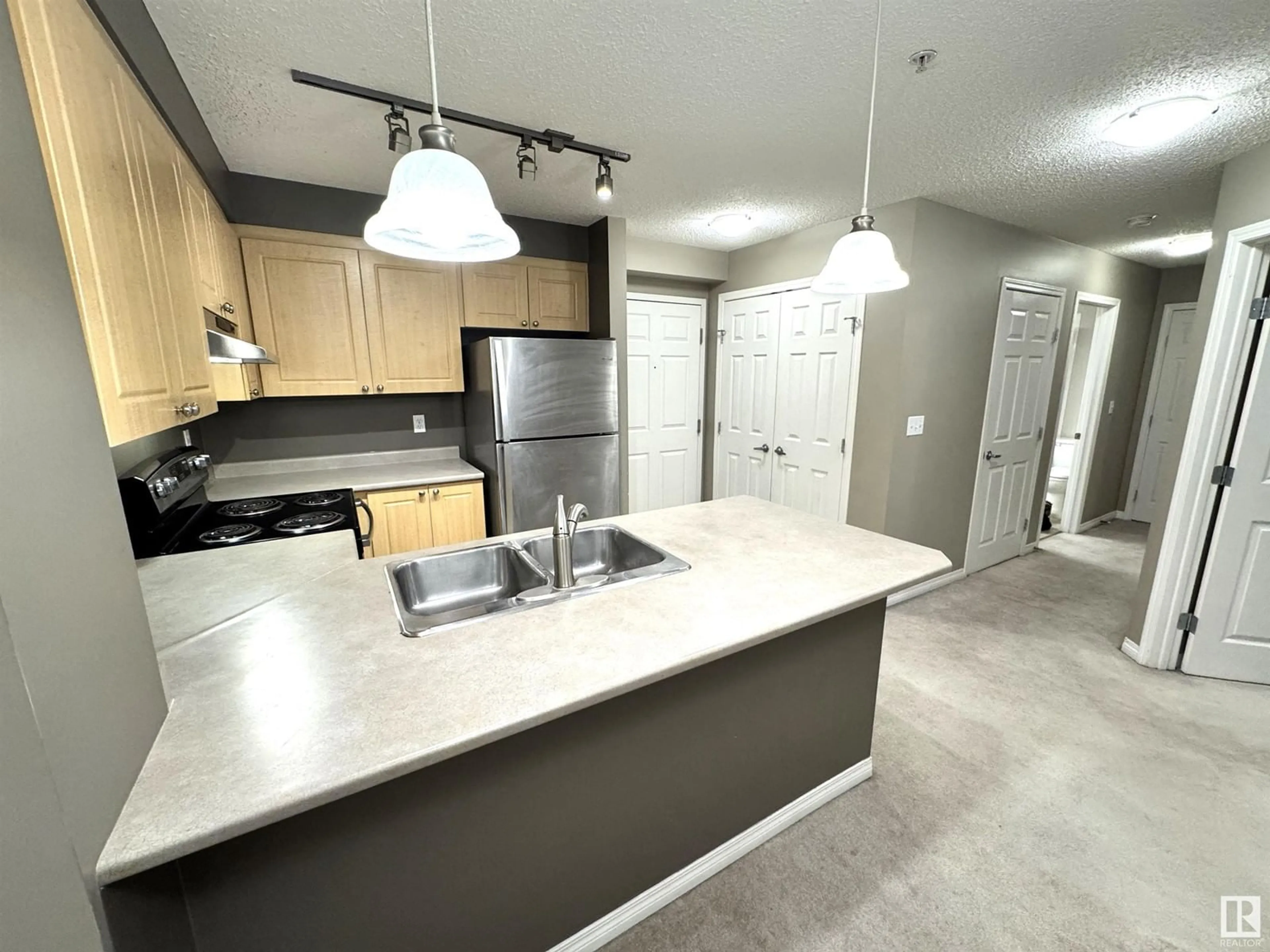 Open concept kitchen, unknown for #205 616 MCALLISTER LO SW, Edmonton Alberta T6W1N2