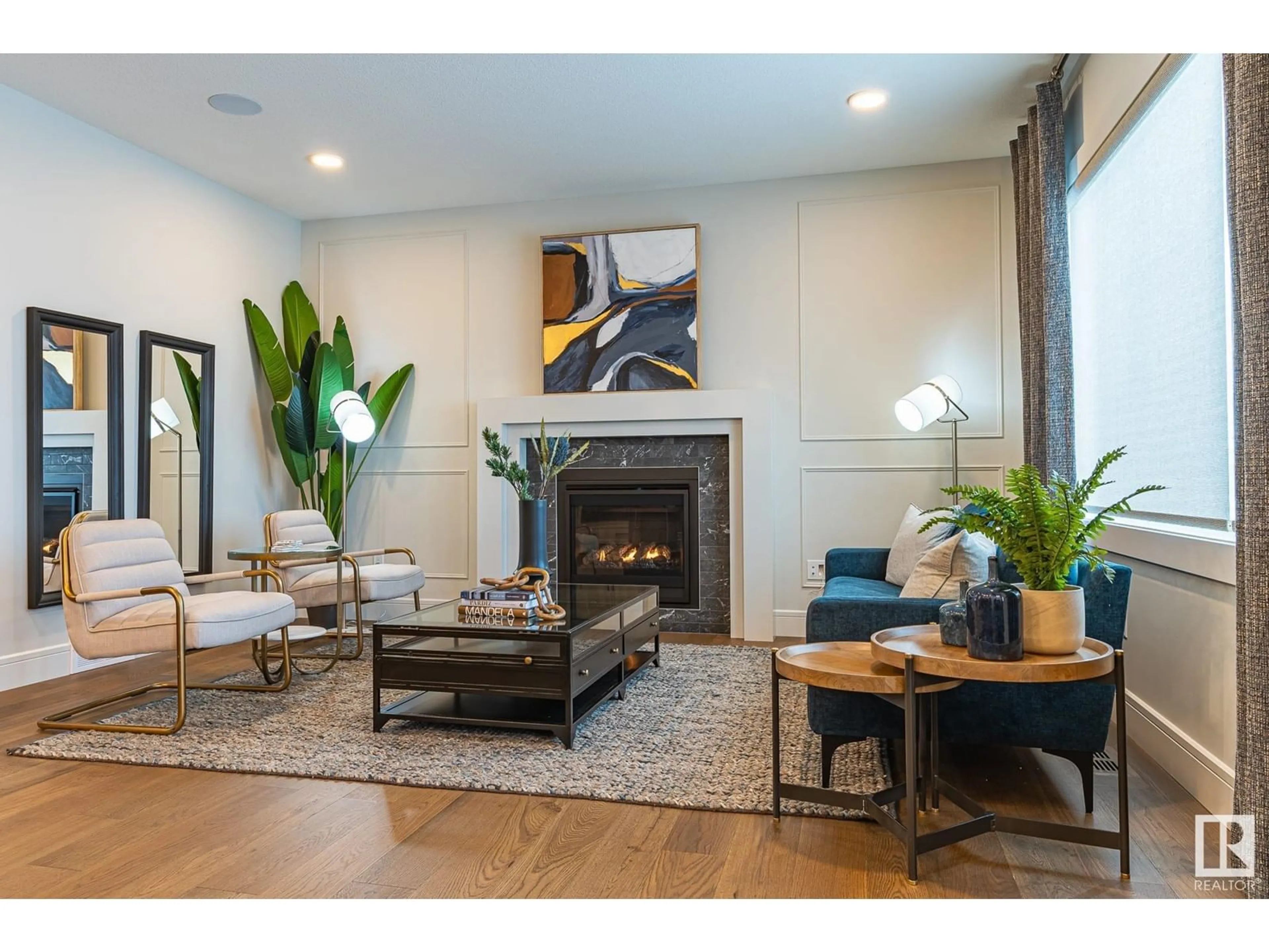 Living room with furniture, wood/laminate floor for 1615 14 ST, Edmonton Alberta T6T2N7