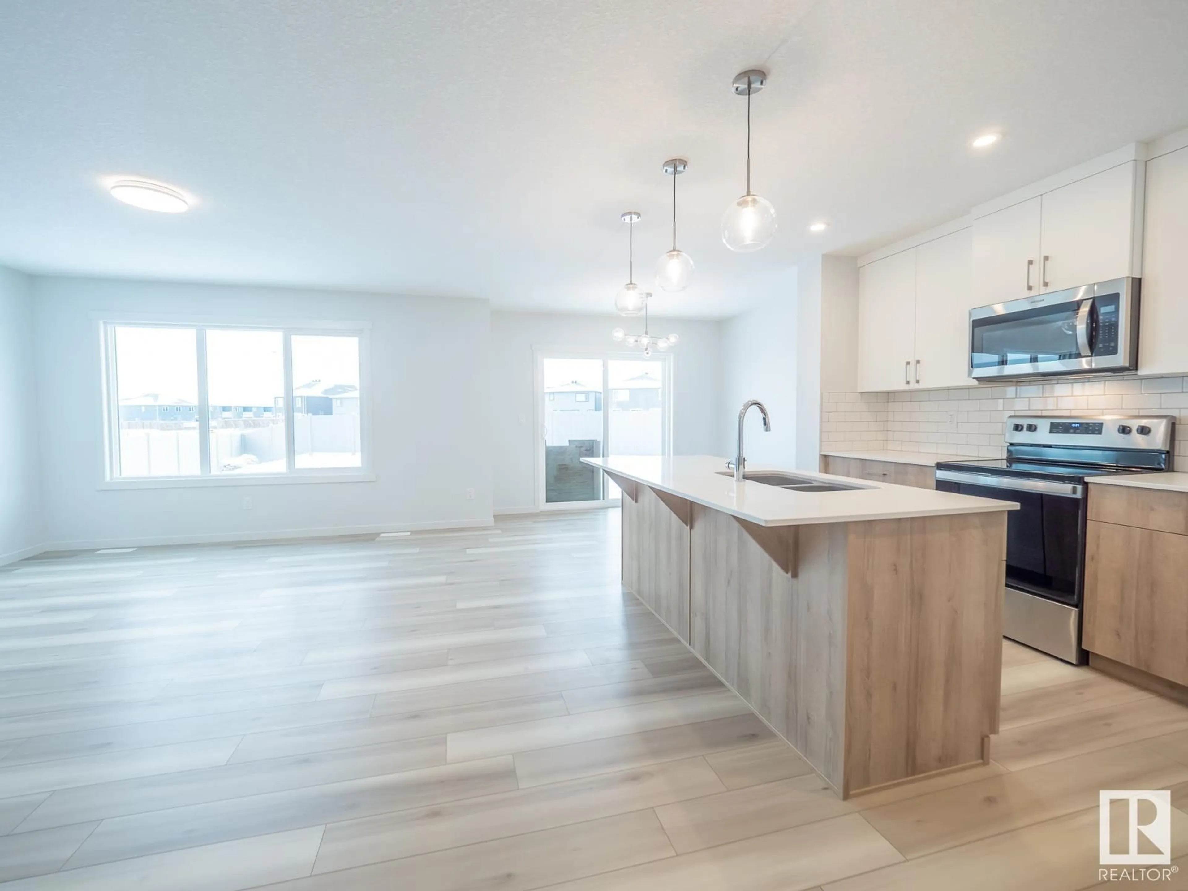 Open concept kitchen, unknown for 2404 206 ST NW, Edmonton Alberta T6M1N6