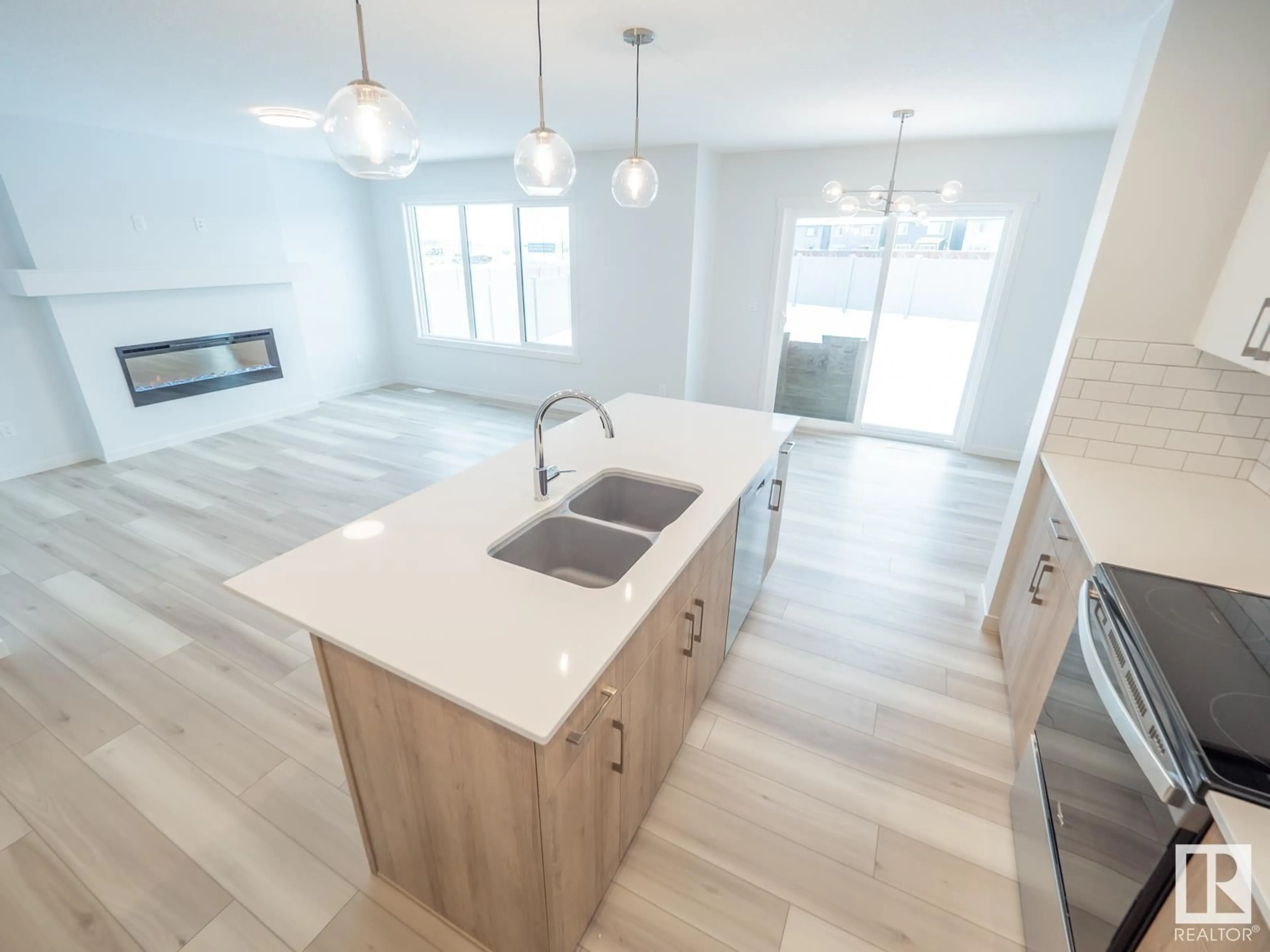 Open concept kitchen, unknown for 2404 206 ST NW, Edmonton Alberta T6M1N6