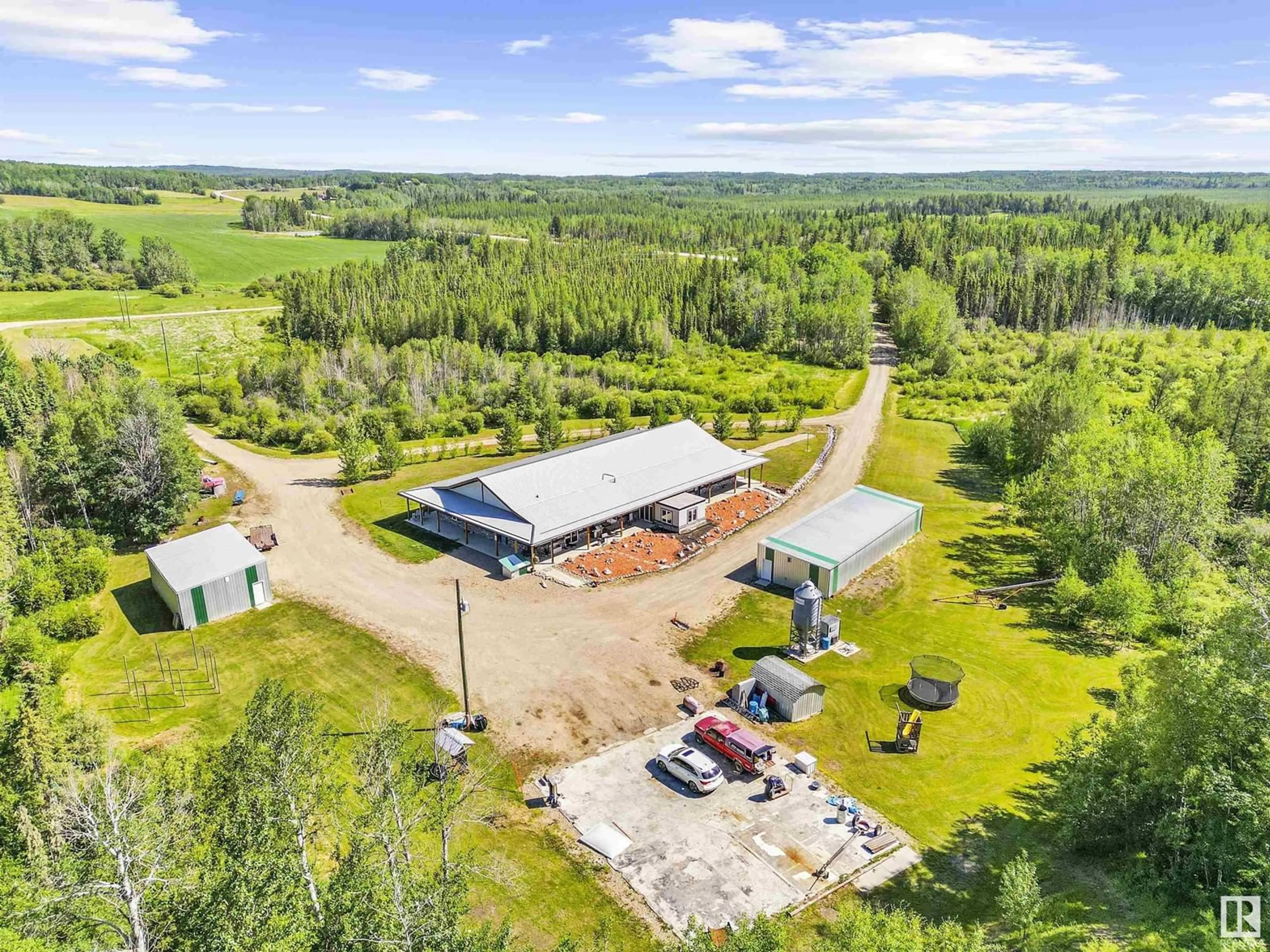 A pic from outside/outdoor area/front of a property/back of a property/a pic from drone, unknown for 51316 HGHWAY 759, Rural Parkland County Alberta T0E2H0