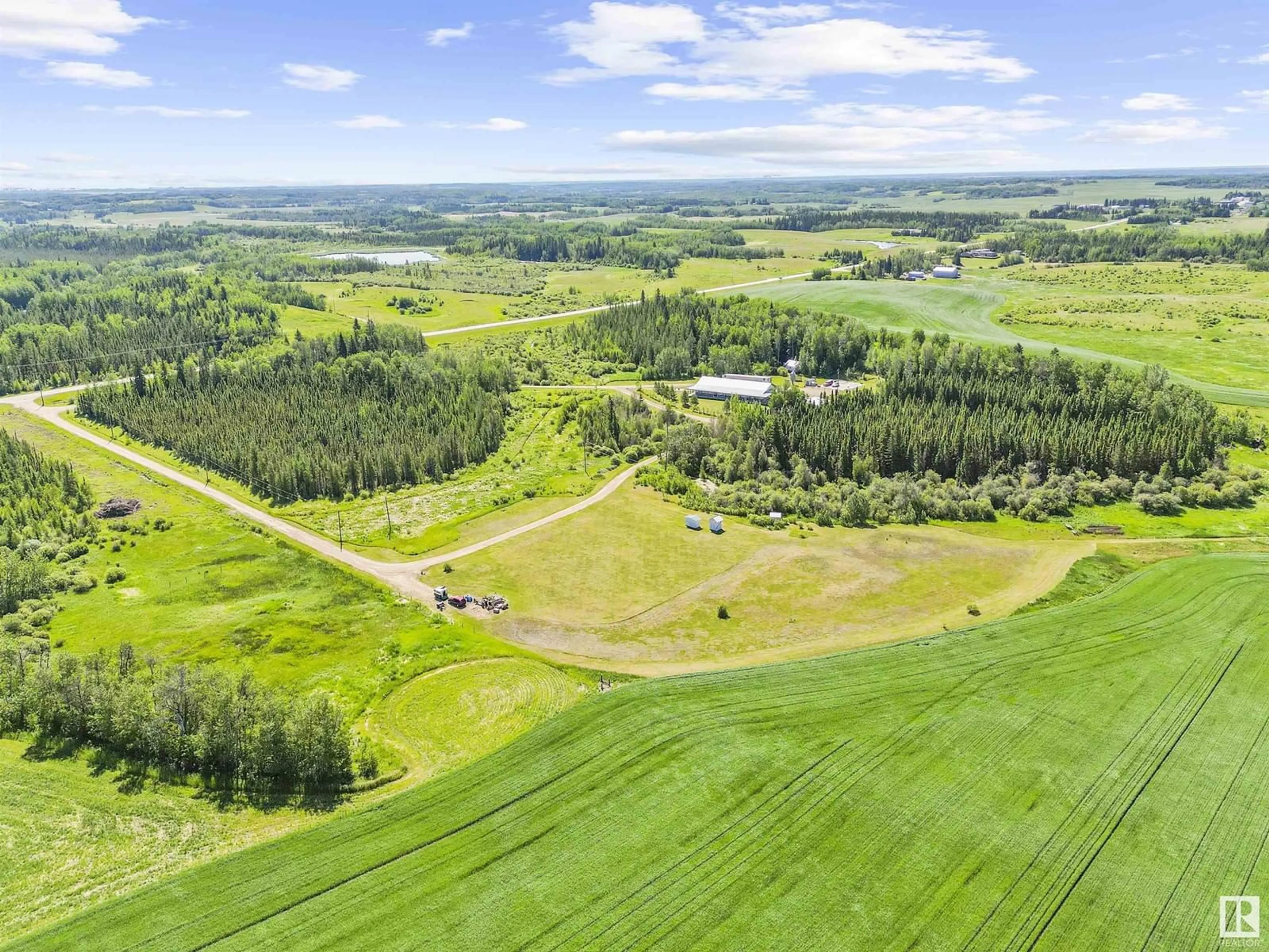 A pic from outside/outdoor area/front of a property/back of a property/a pic from drone, forest/trees view for 51316 HGHWAY 759, Rural Parkland County Alberta T0E2H0