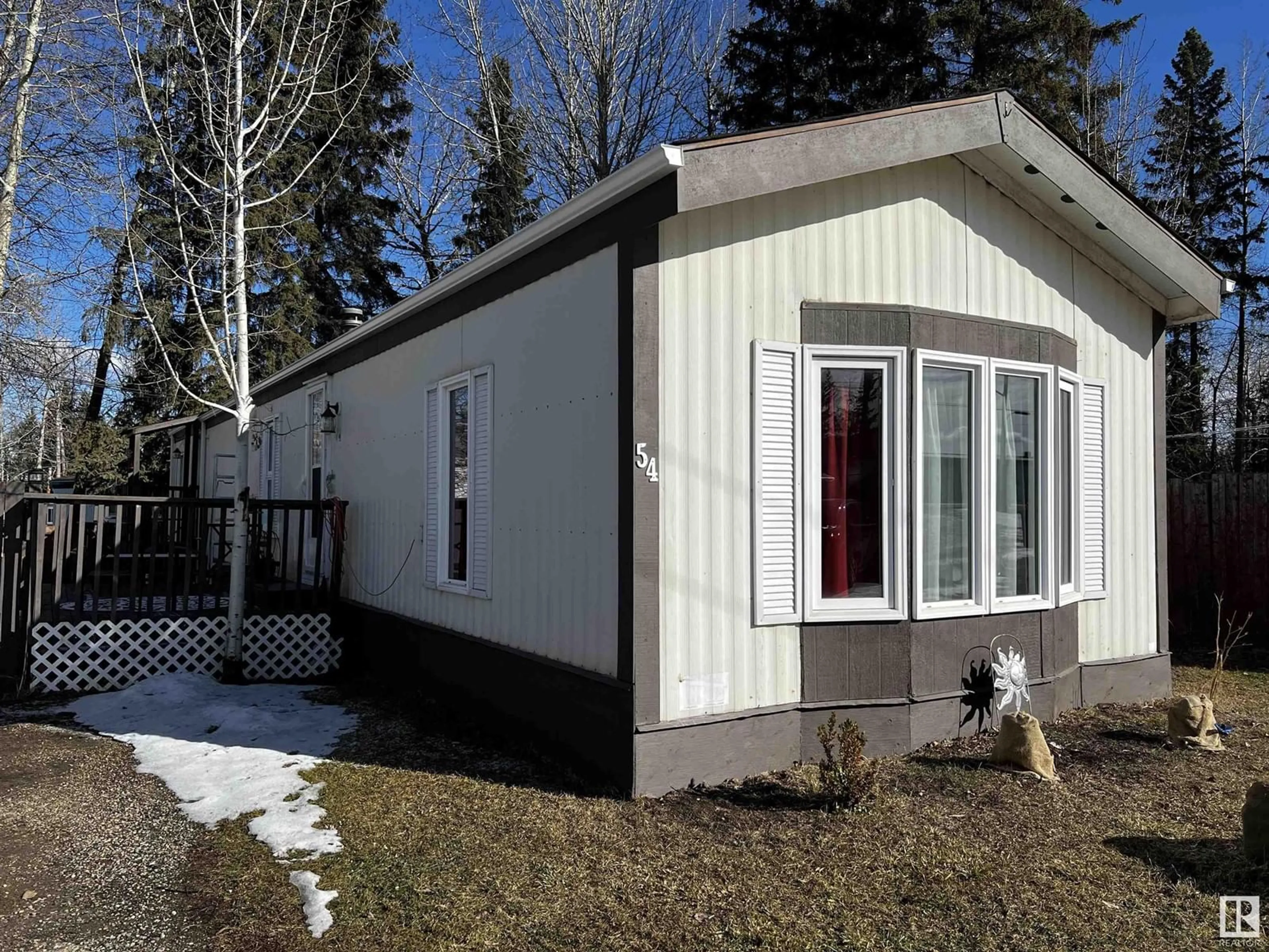 Home with vinyl exterior material, street for #54 5002 56 AV, Drayton Valley Alberta T7A1M6