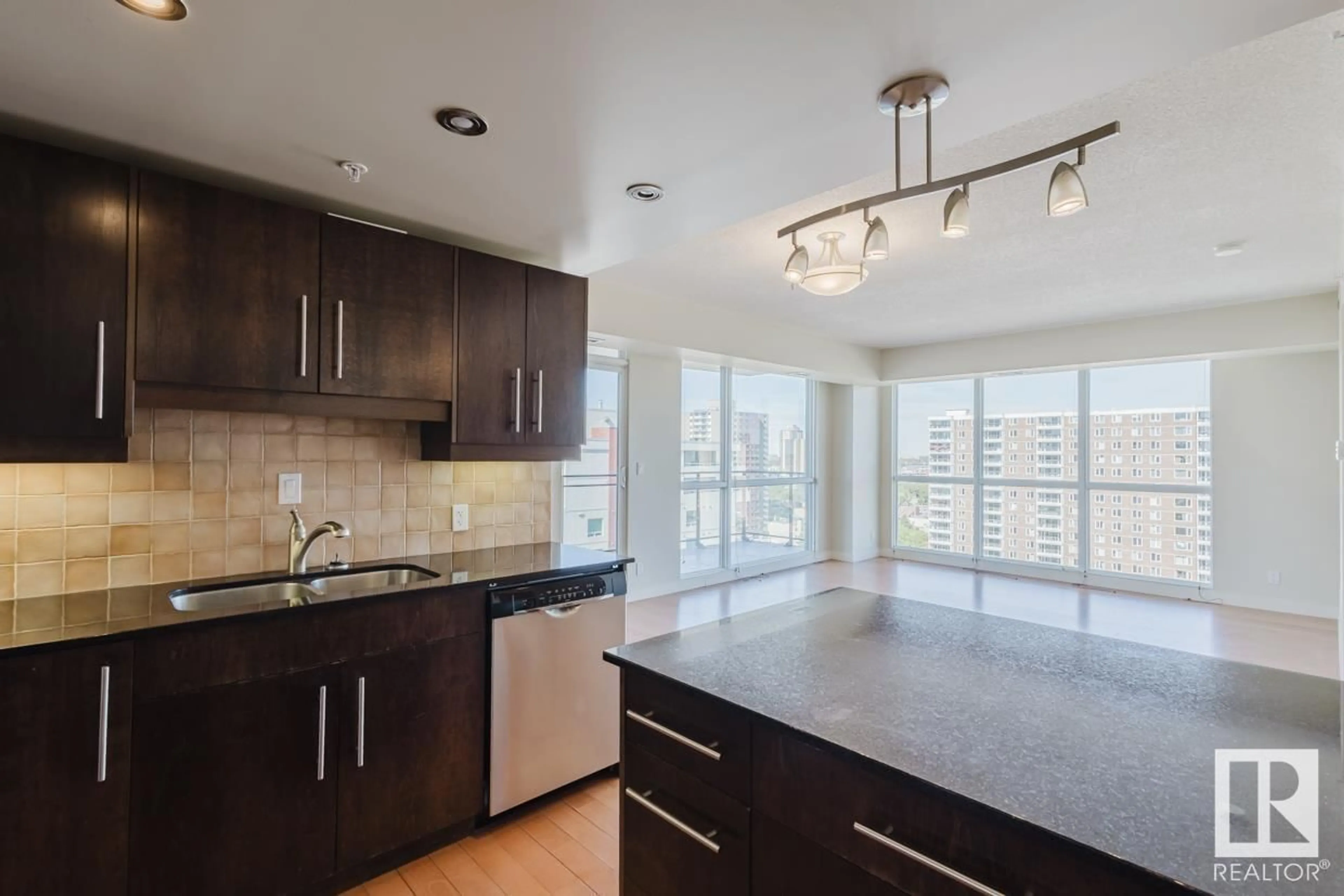 Open concept kitchen, unknown for #1403 10046 117 ST NW, Edmonton Alberta T5K1X2