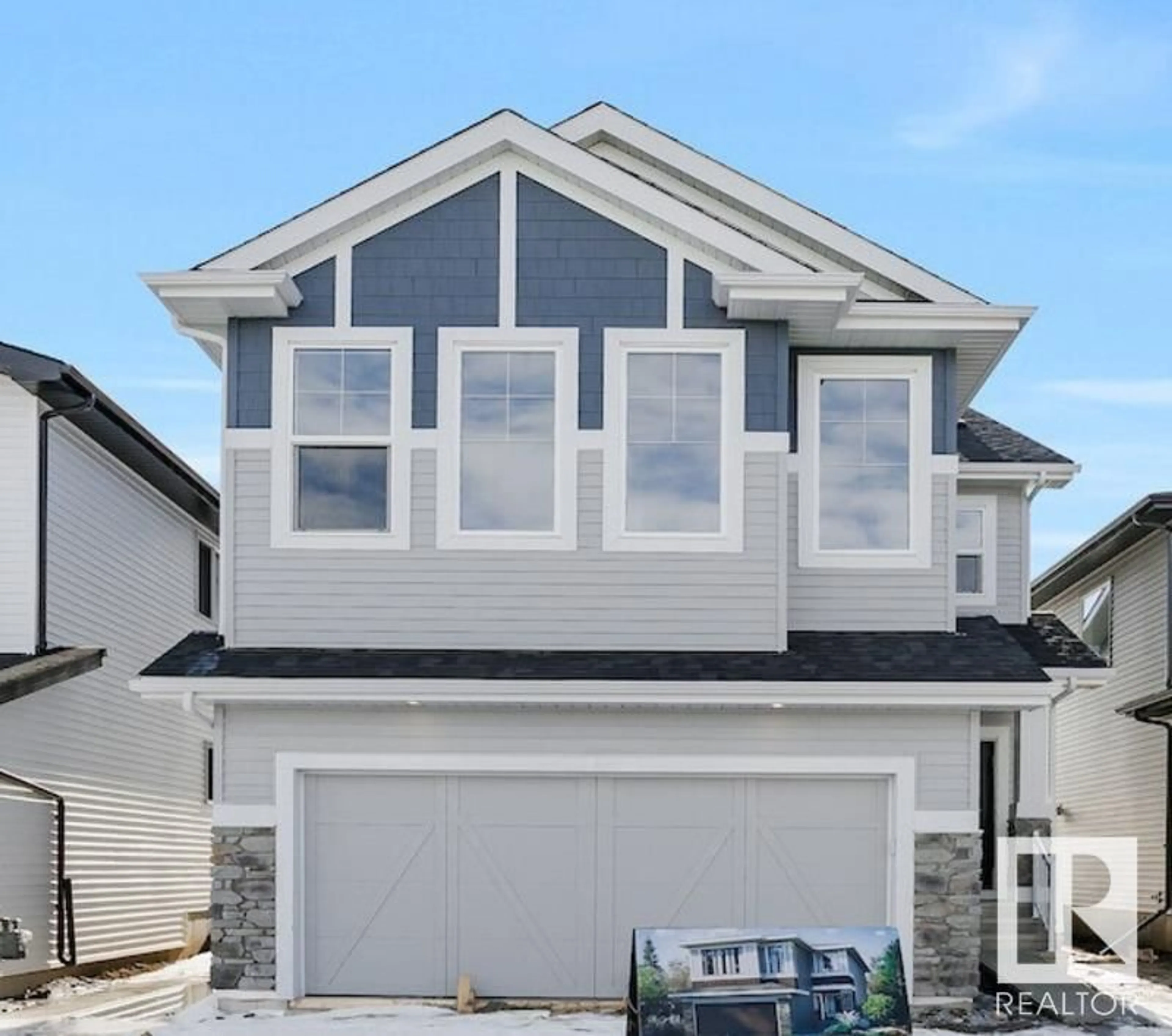 Home with vinyl exterior material, street for 7203 182 AV NW, Edmonton Alberta T5Z0J1