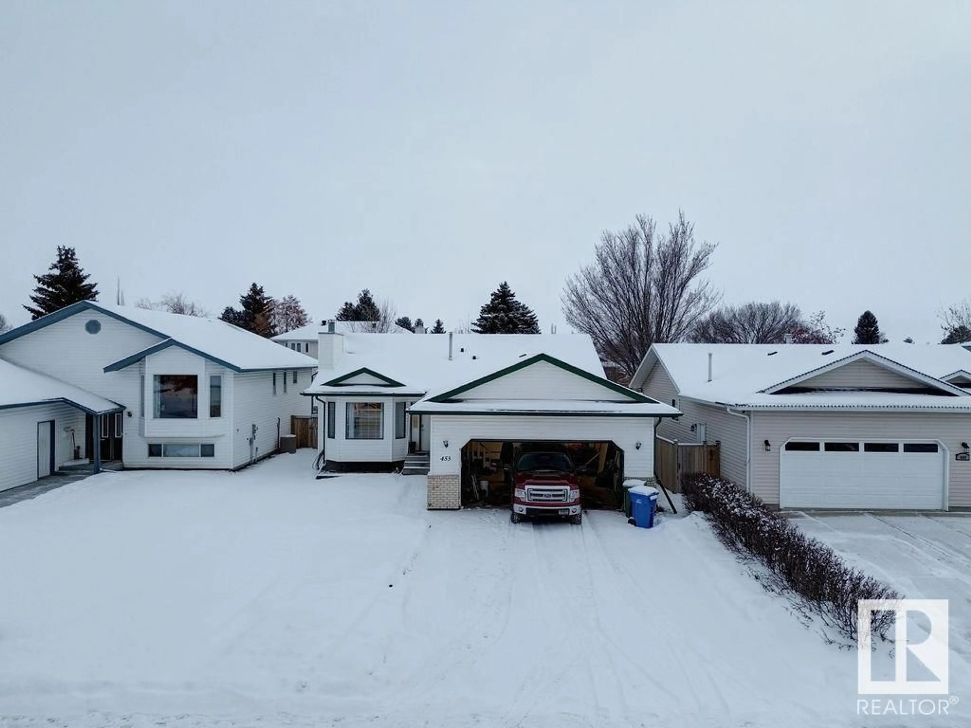 A pic from outside/outdoor area/front of a property/back of a property/a pic from drone, street for 453 Garden Meadows DR, Wetaskiwin Alberta T9A3K3