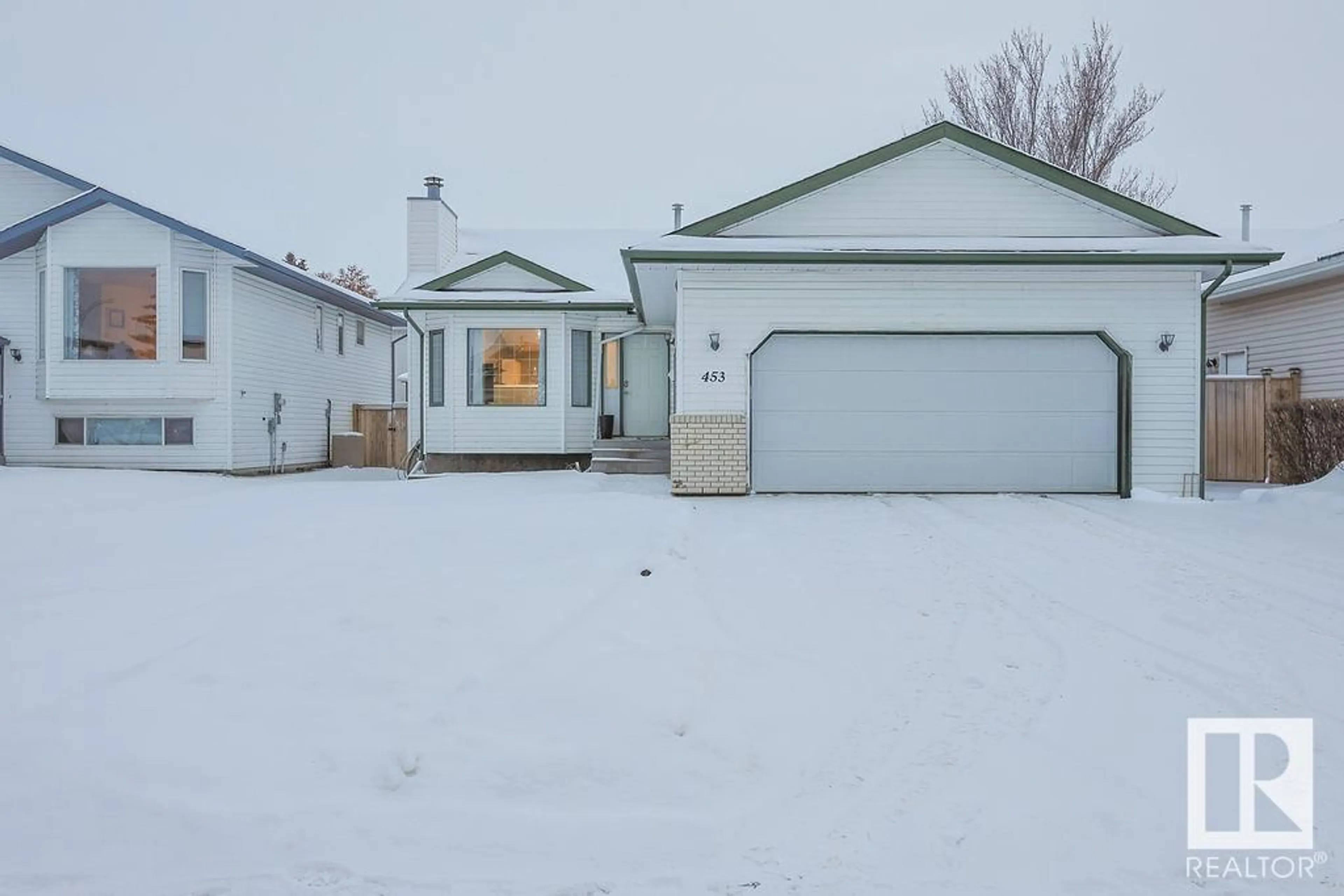 A pic from outside/outdoor area/front of a property/back of a property/a pic from drone, street for 453 Garden Meadows DR, Wetaskiwin Alberta T9A3K3