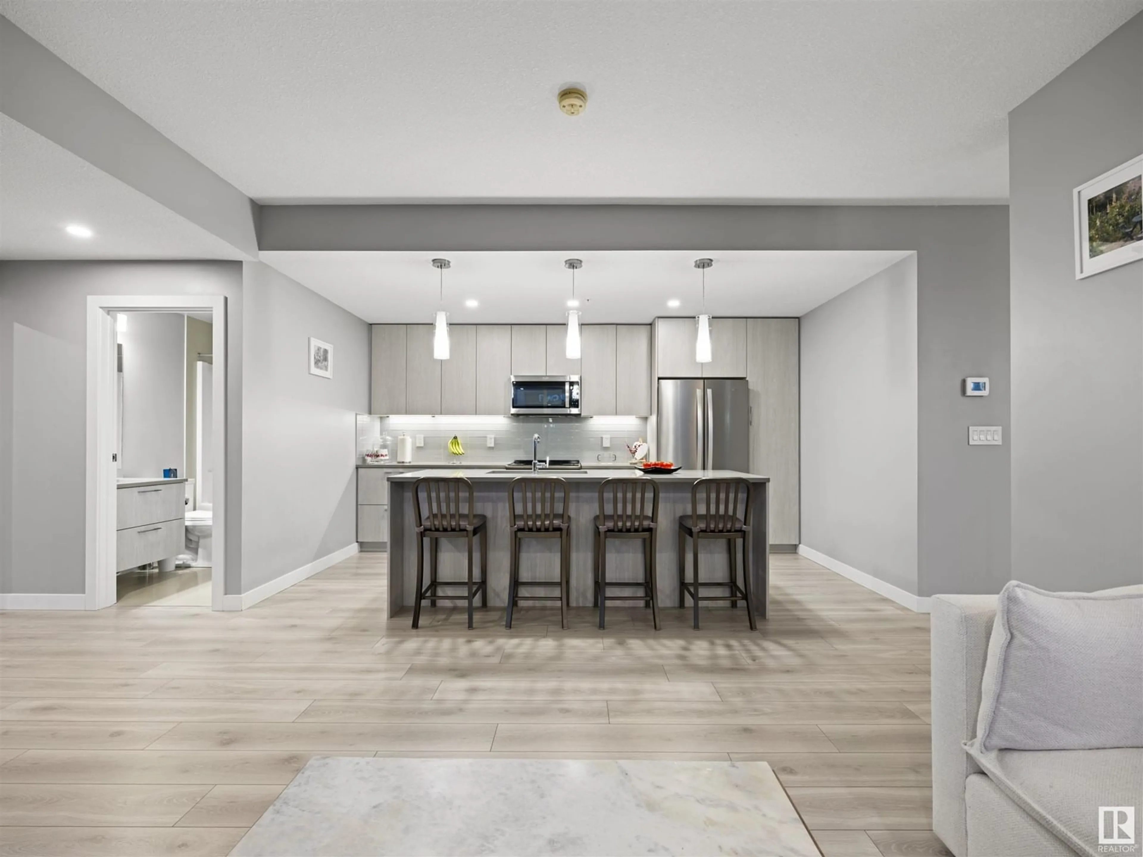 Open concept kitchen, ceramic/tile floor for 3200 10180 103 ST NW, Edmonton Alberta T5J0L1