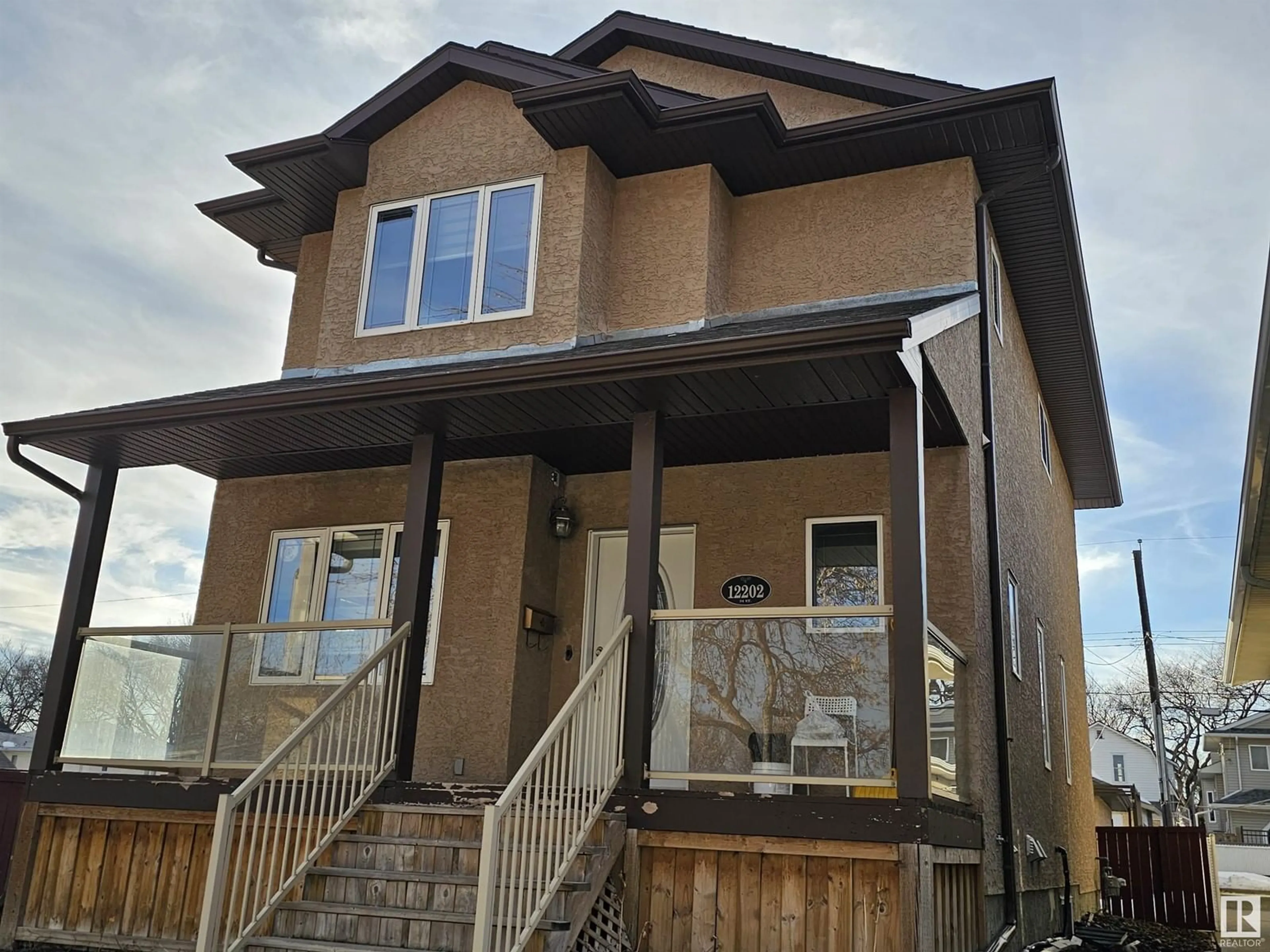 Home with vinyl exterior material, building for 12202 94 ST NW, Edmonton Alberta T5G1K1