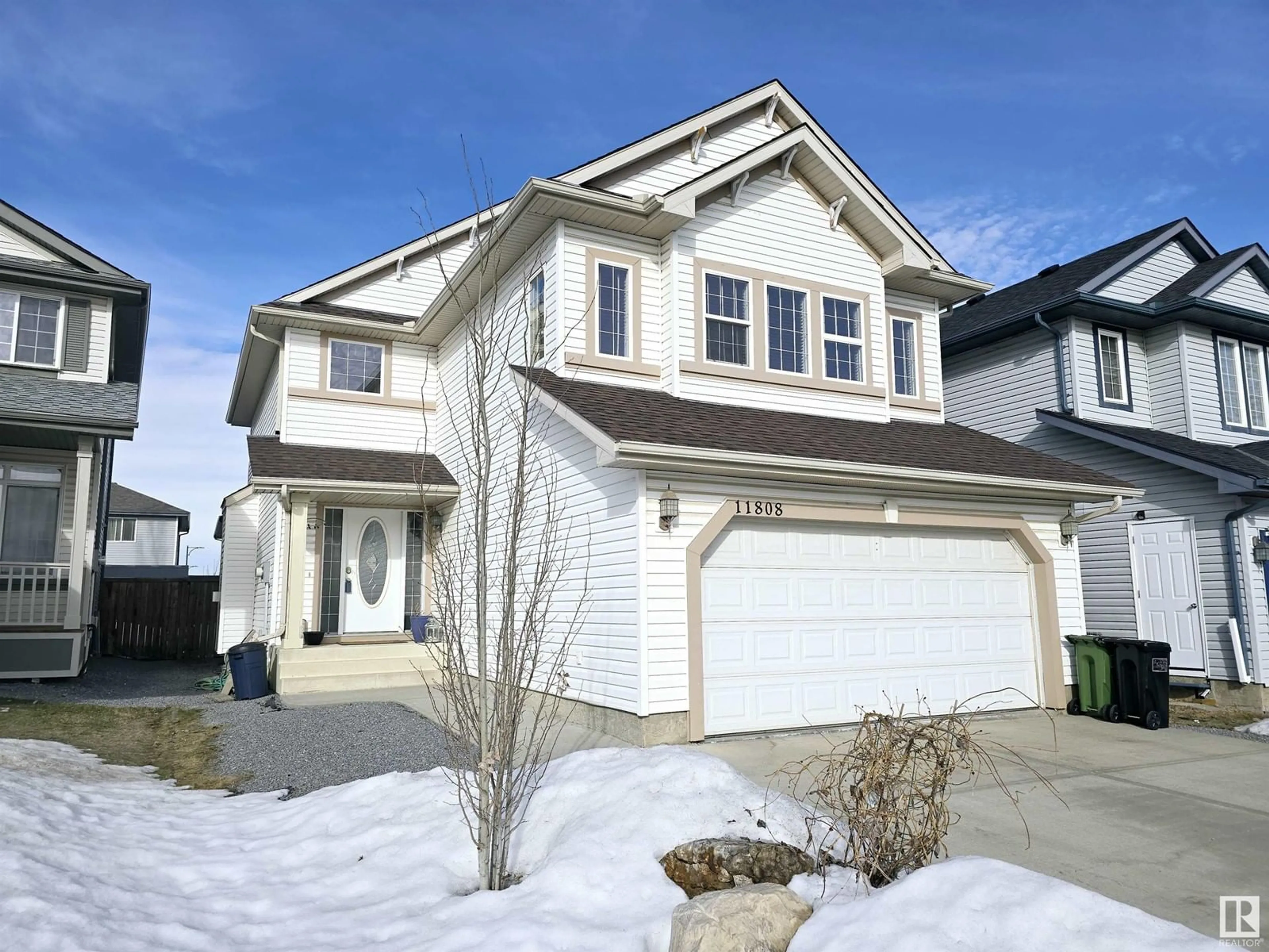 Home with vinyl exterior material, street for SW - 11808 13 AV, Edmonton Alberta T6W0C1