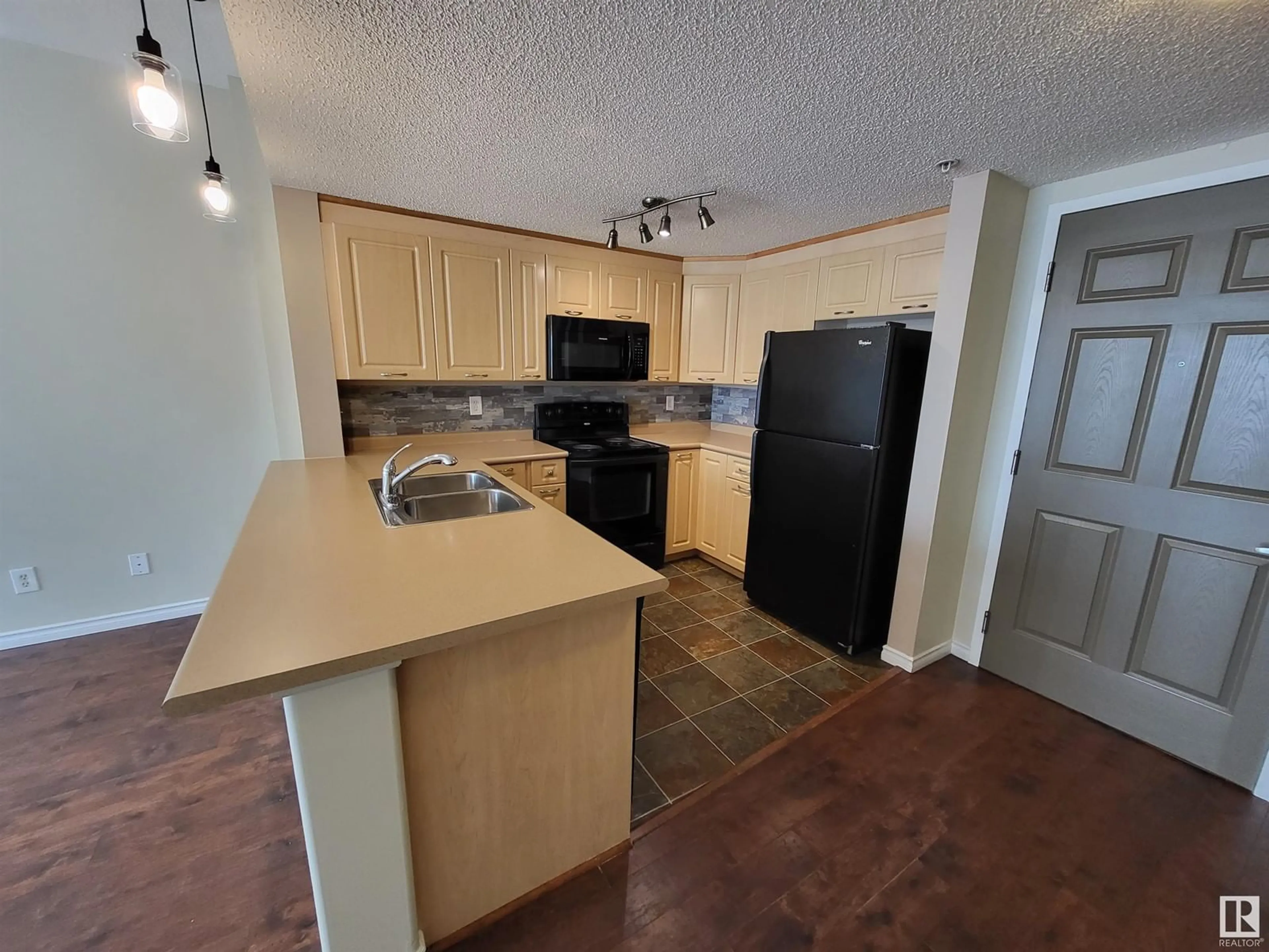 Standard kitchen, unknown for #324 - 6315 135 AV, Edmonton Alberta T5A0A8