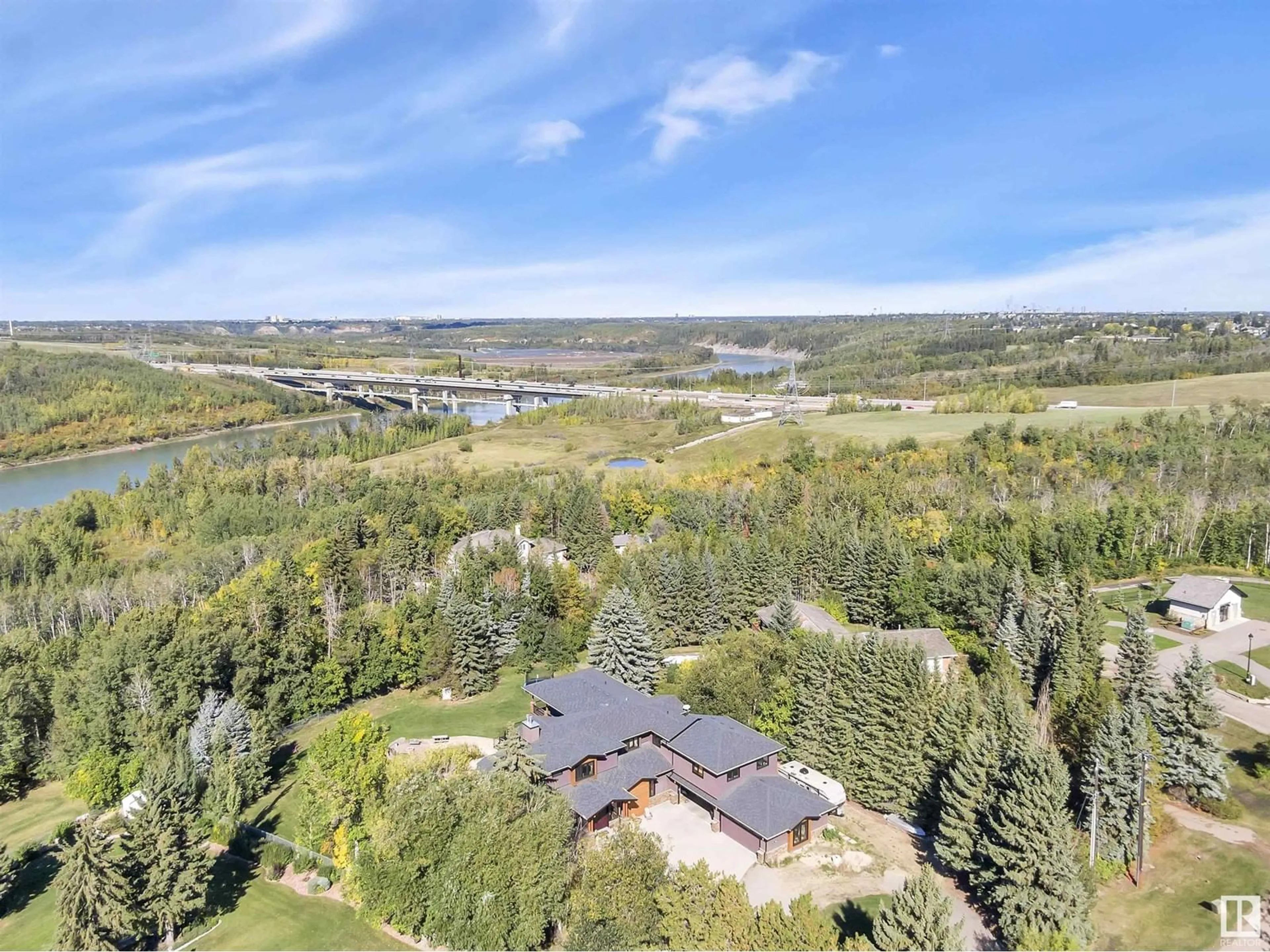A pic from outside/outdoor area/front of a property/back of a property/a pic from drone, water/lake/river/ocean view for 148 WINDERMERE CR, Edmonton Alberta T6W0S3