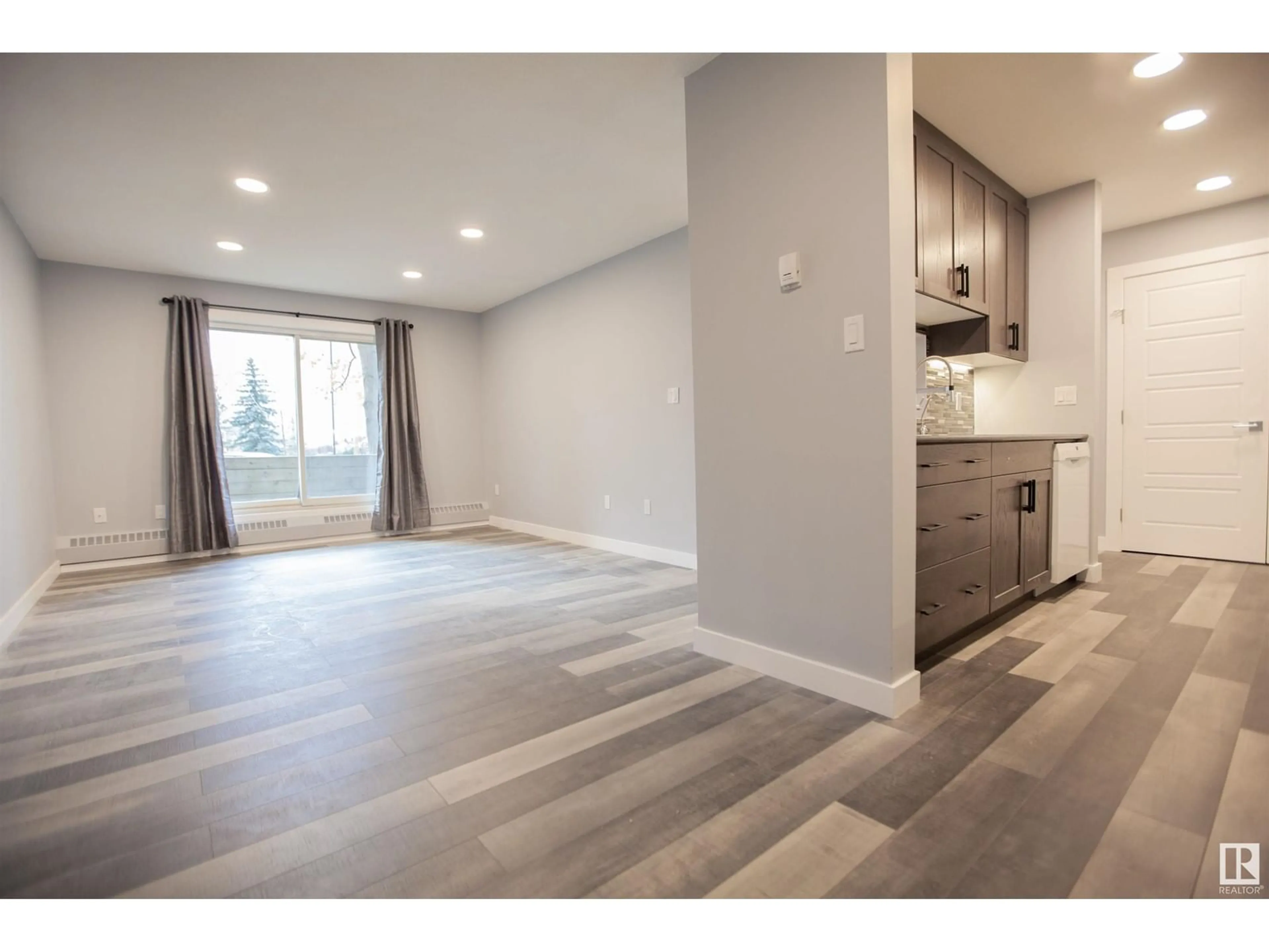 Open concept kitchen, unknown for #109 2508 50 ST NW NW, Edmonton Alberta T6L6X9