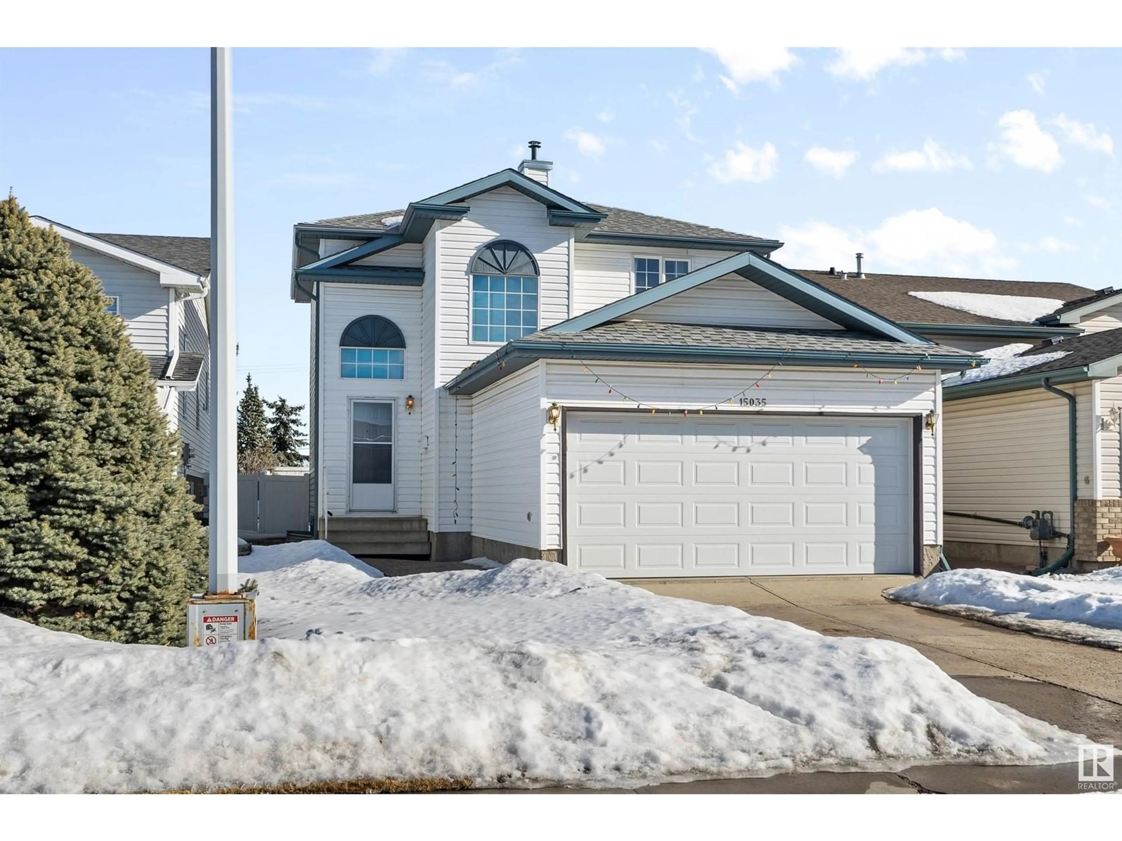 Home with vinyl exterior material, street for 15035 128 ST NW, Edmonton Alberta T6V1E8