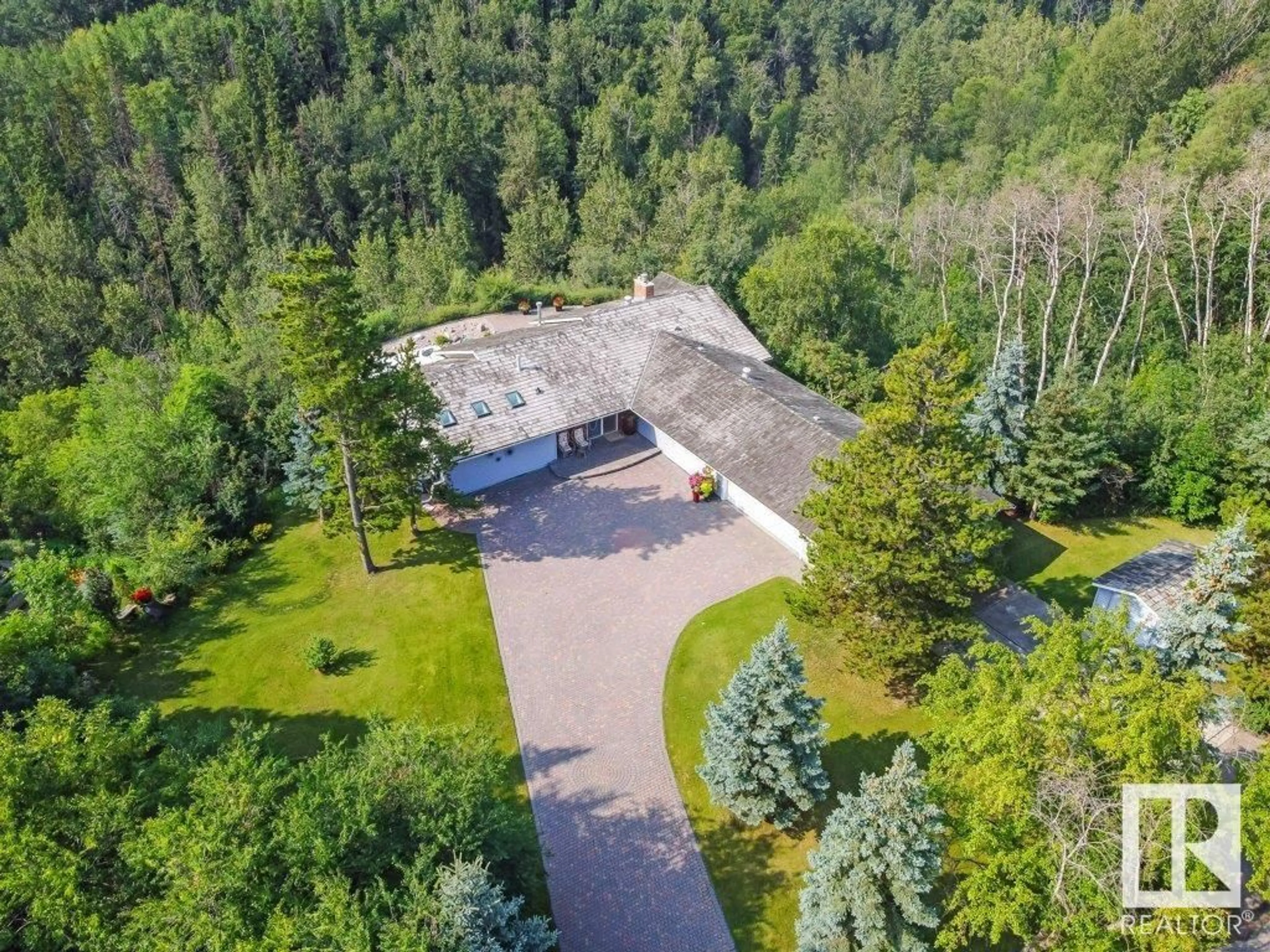 A pic from outside/outdoor area/front of a property/back of a property/a pic from drone, forest/trees view for 1 DONSDALE CR NW, Edmonton Alberta T6M2N3