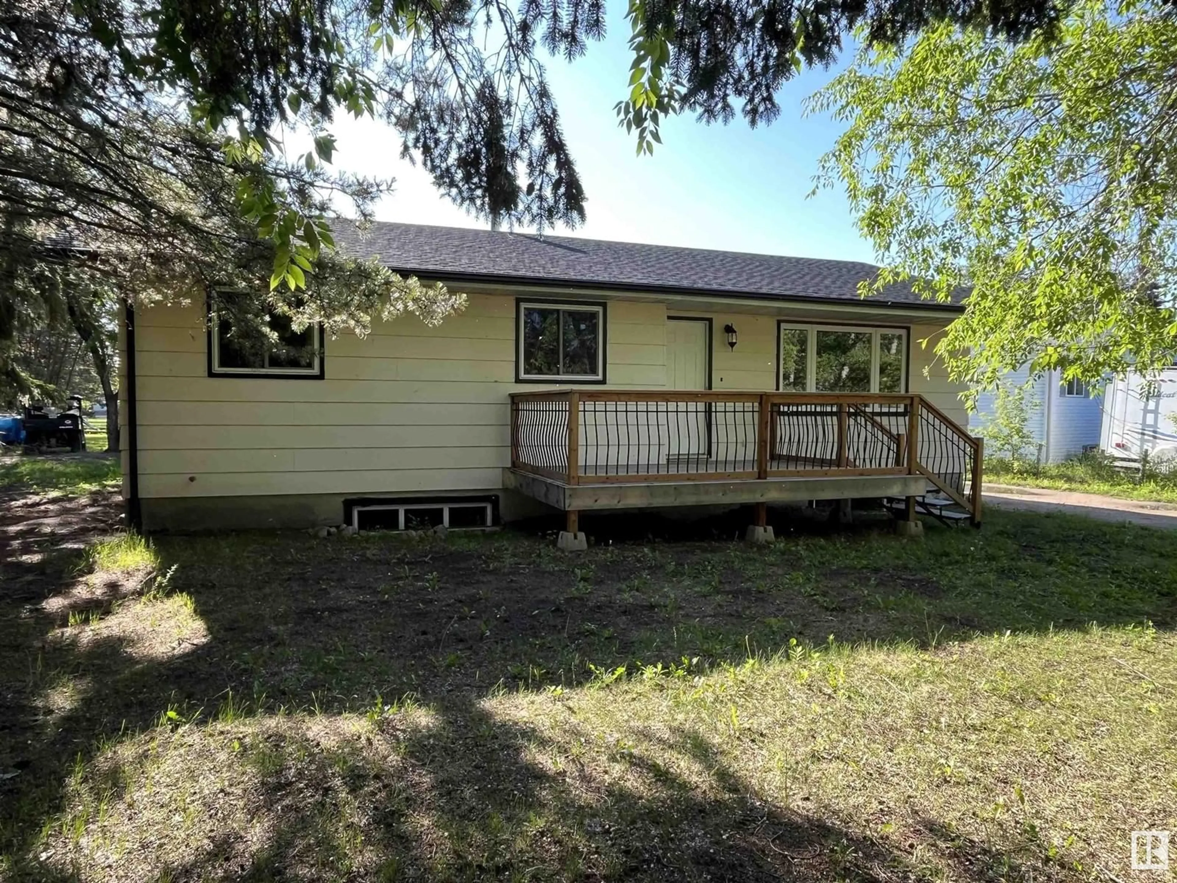 A pic from outside/outdoor area/front of a property/back of a property/a pic from drone, building for 405 - 61314 RR 463, Rural Bonnyville M.D. Alberta T9N2G9