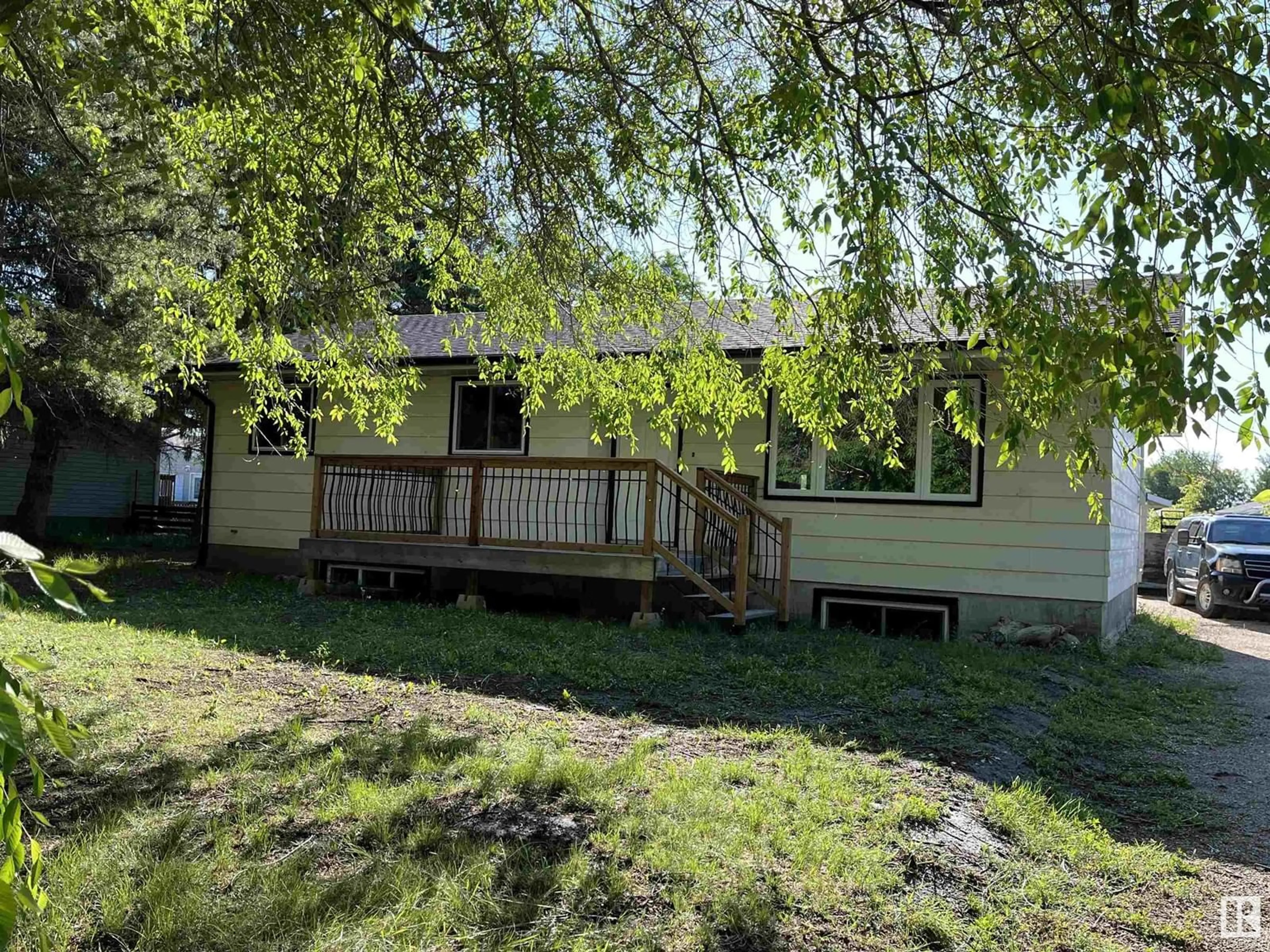 A pic from outside/outdoor area/front of a property/back of a property/a pic from drone, unknown for 405 - 61314 RR 463, Rural Bonnyville M.D. Alberta T9N2G9