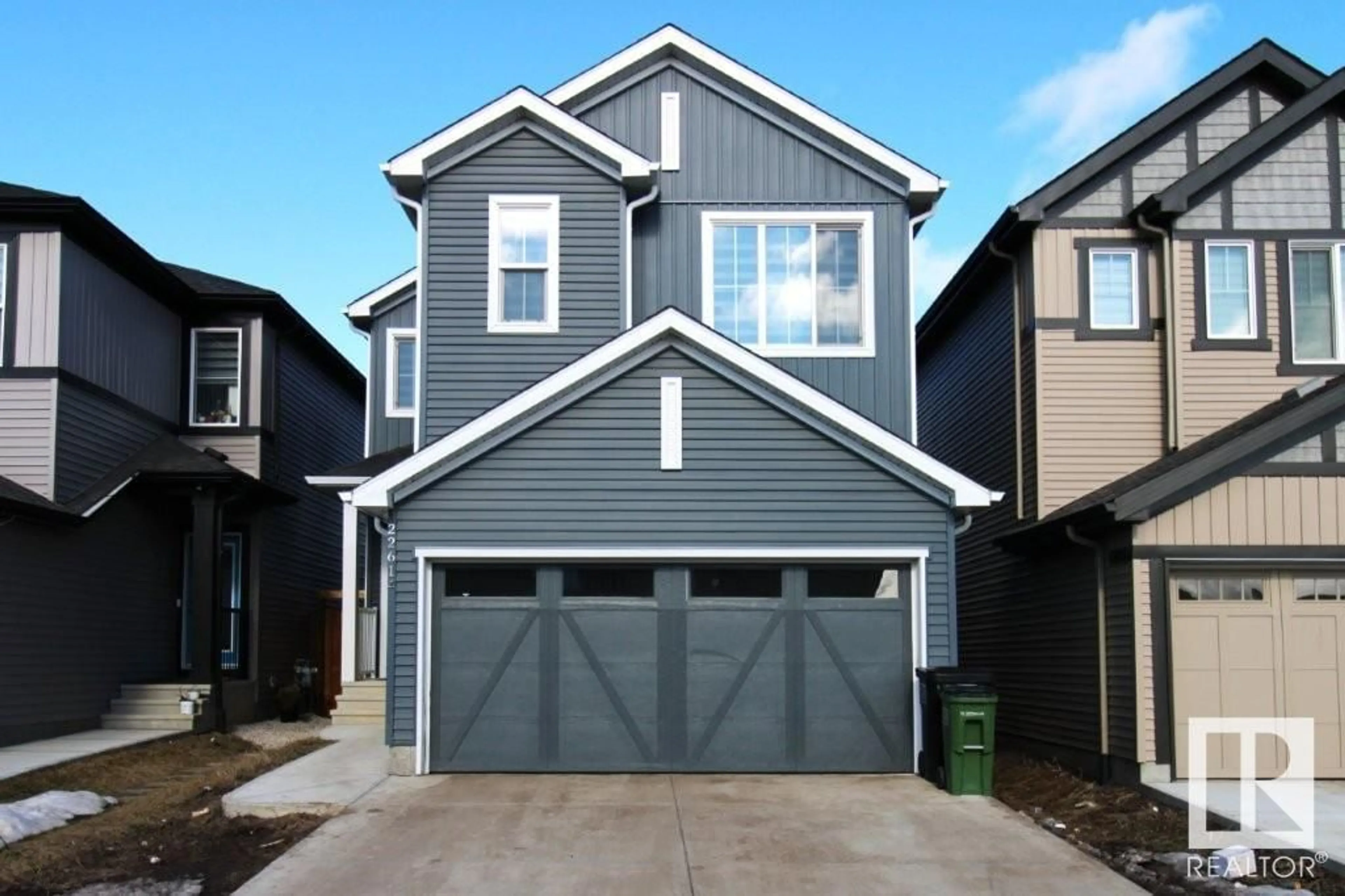 Home with vinyl exterior material, street for 22614 99A AV NW, Edmonton Alberta T5T7V1