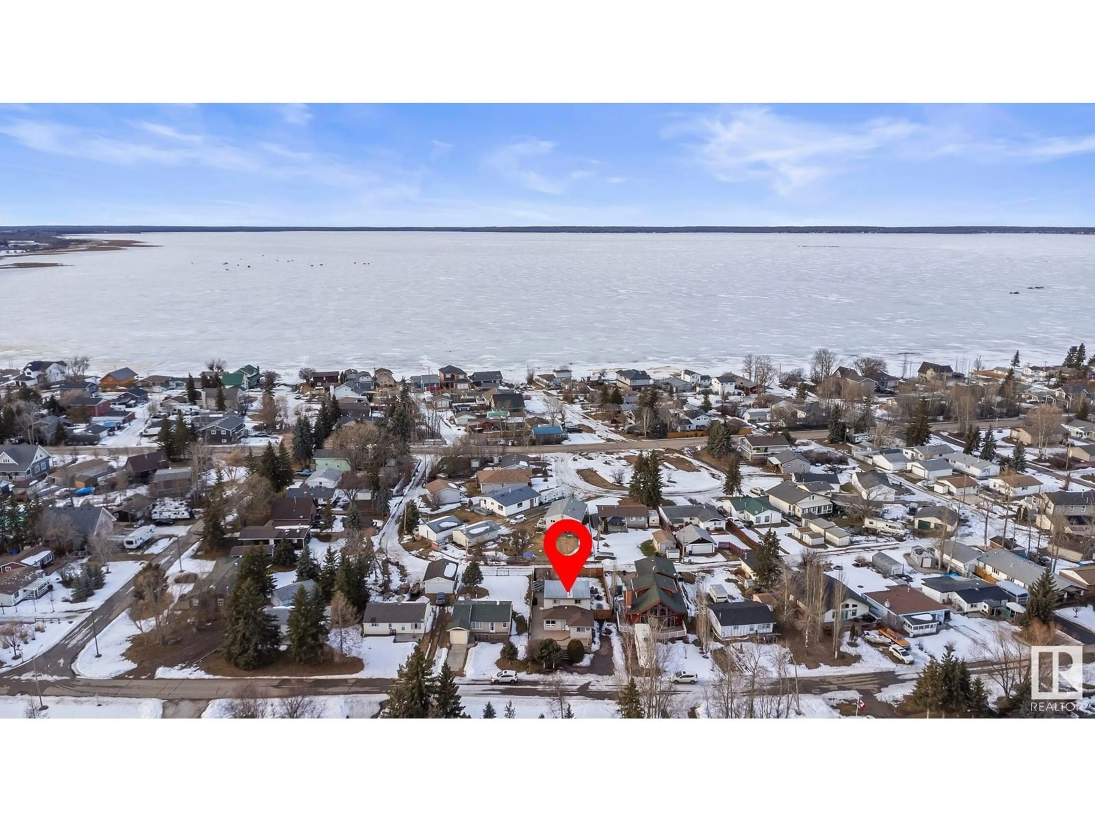 A pic from outside/outdoor area/front of a property/back of a property/a pic from drone, water/lake/river/ocean view for 5712 49 AVE NW, Rural Lac Ste. Anne County Alberta T0E0A0