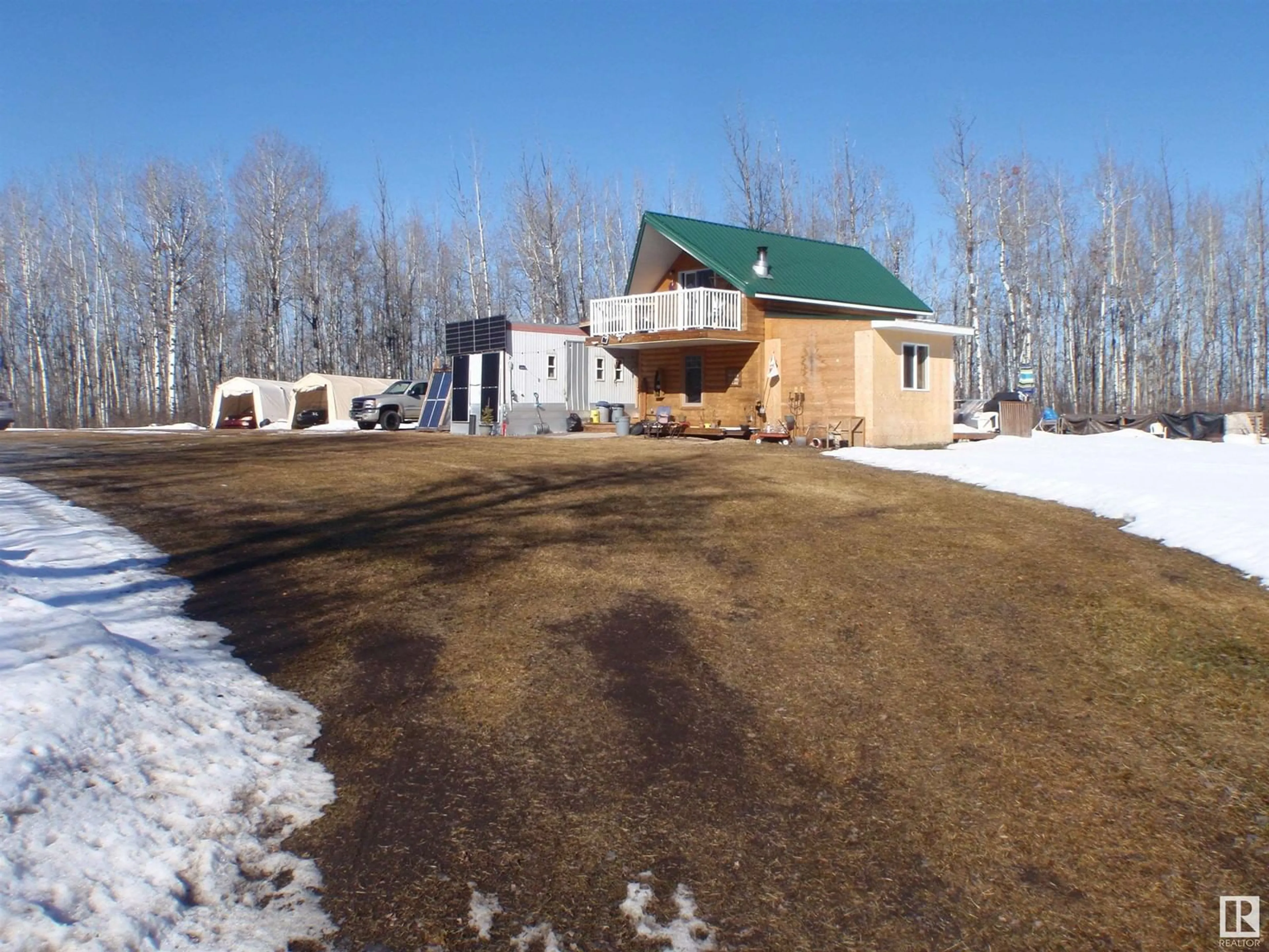 A pic from outside/outdoor area/front of a property/back of a property/a pic from drone, mountain view for 59301 Rge Rd 65, Rural Lac Ste. Anne County Alberta T7N1N3