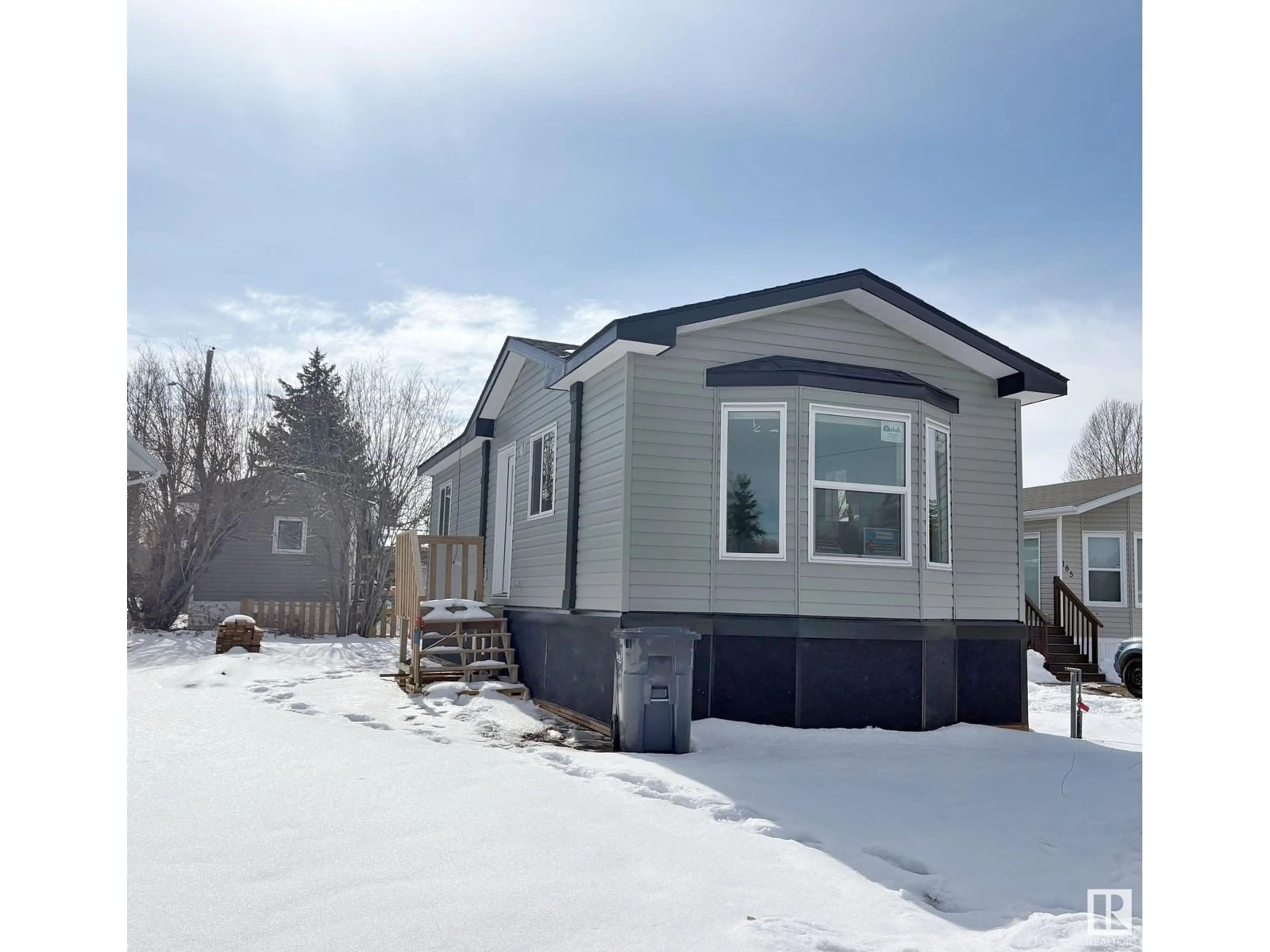 Home with vinyl exterior material, street for 184 305 CALAHOO RD, Spruce Grove Alberta T7X3L1