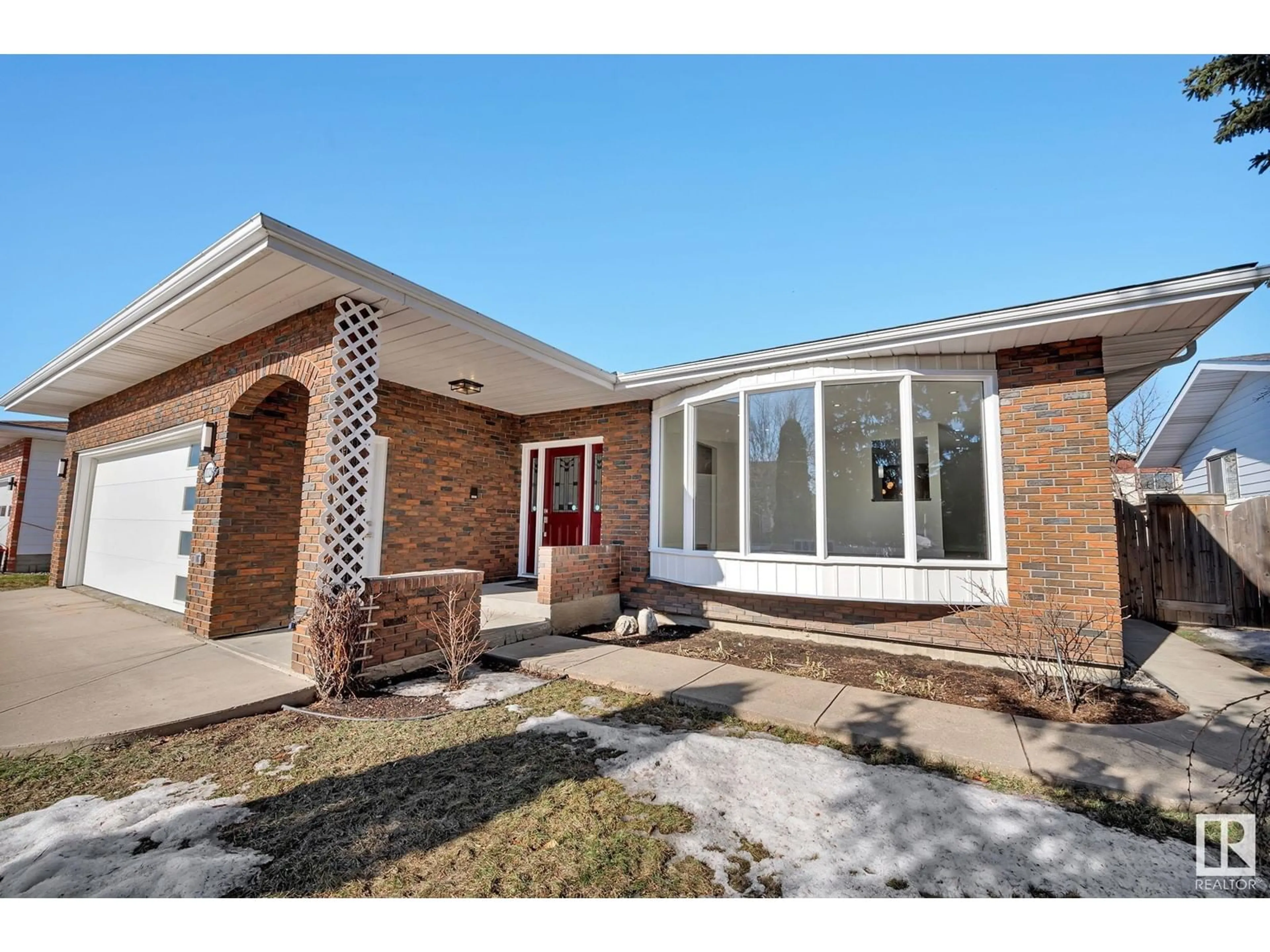 Home with brick exterior material, street for 11126 29A AV NW, Edmonton Alberta T6J3Z3