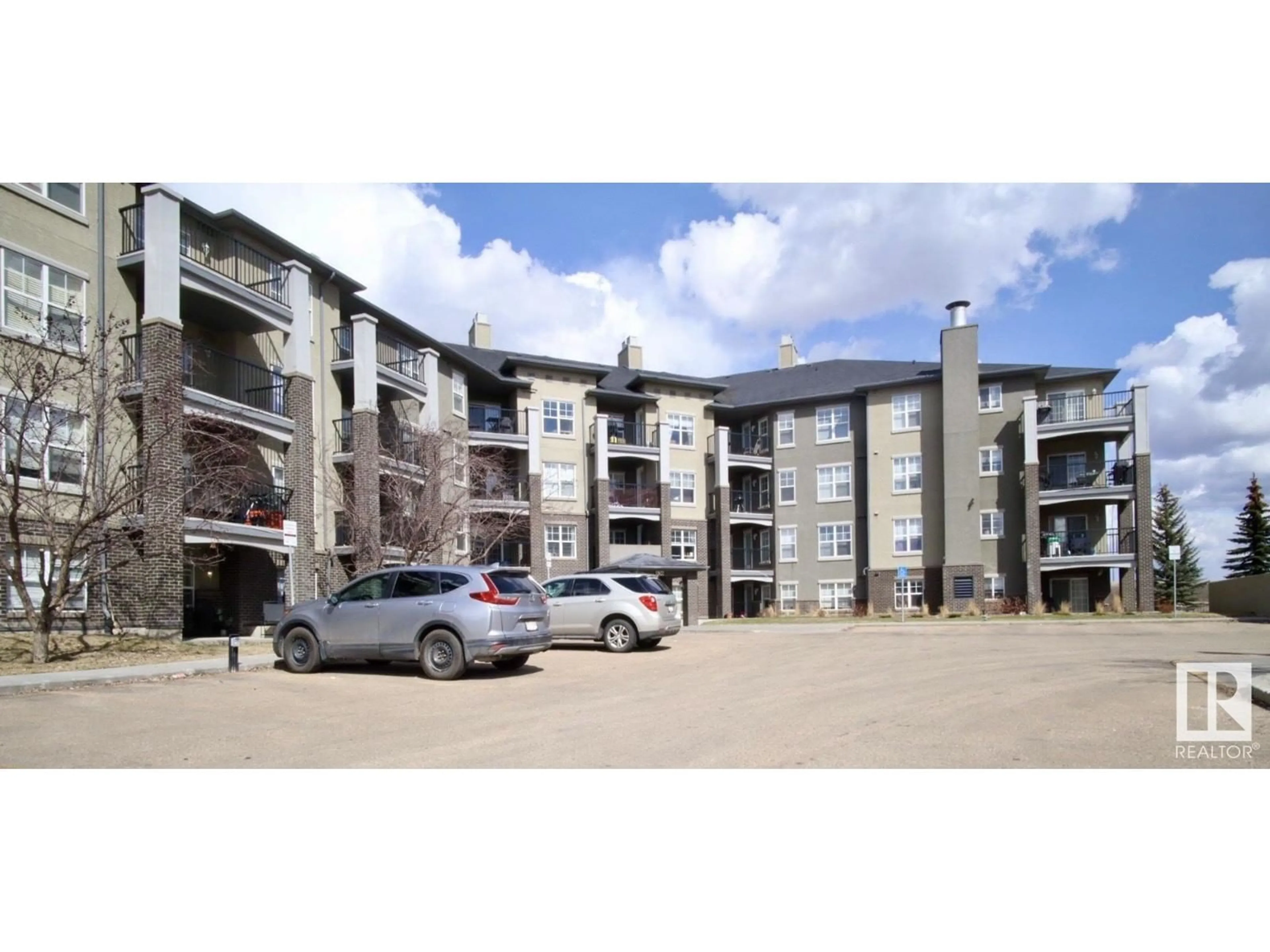 A pic from outside/outdoor area/front of a property/back of a property/a pic from drone, building for #112 636 MCALLISTER LO SW, Edmonton Alberta T6W1N4