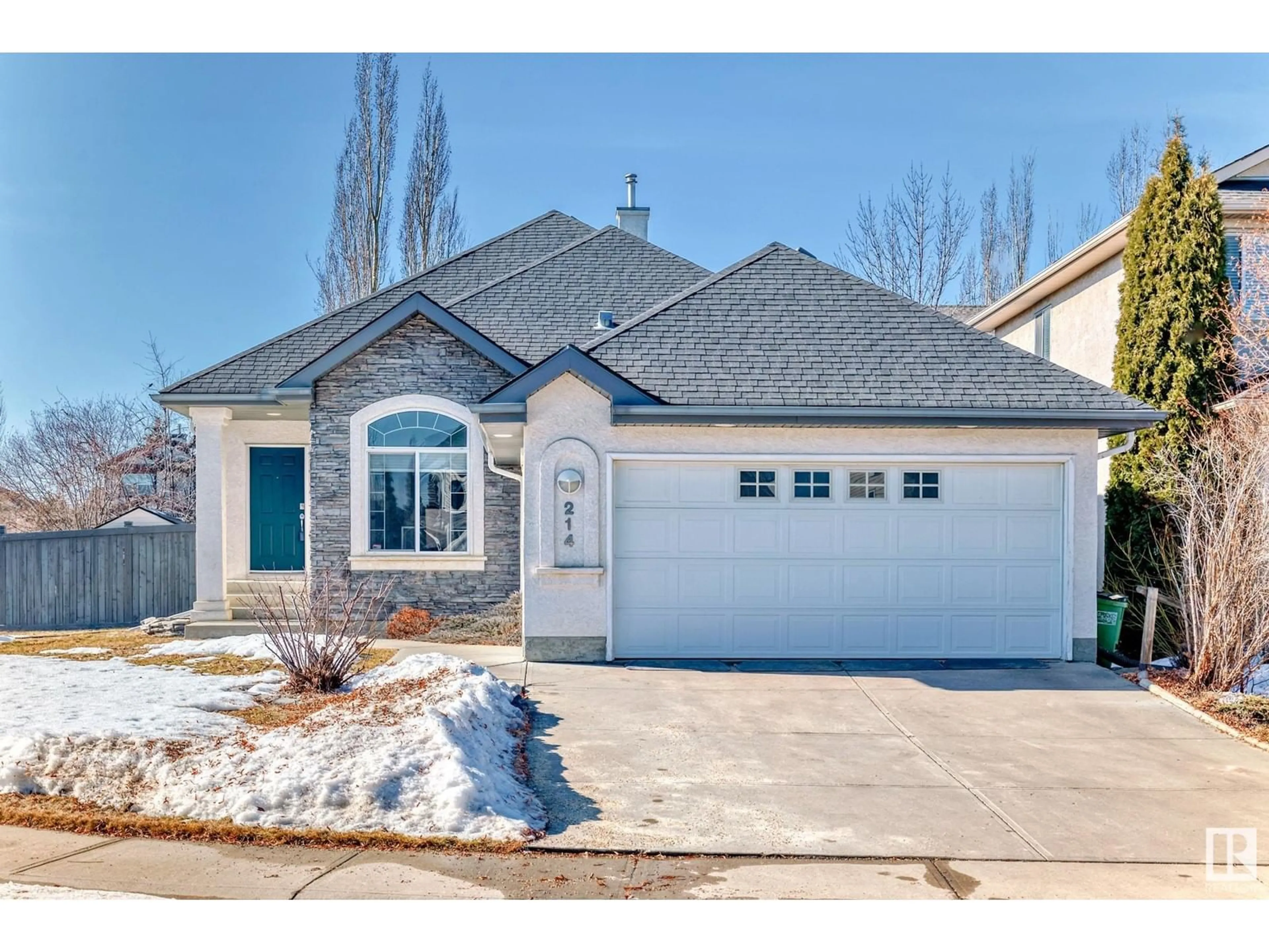 Home with vinyl exterior material, street for 214 BYRNE PL SW, Edmonton Alberta T6W1E3