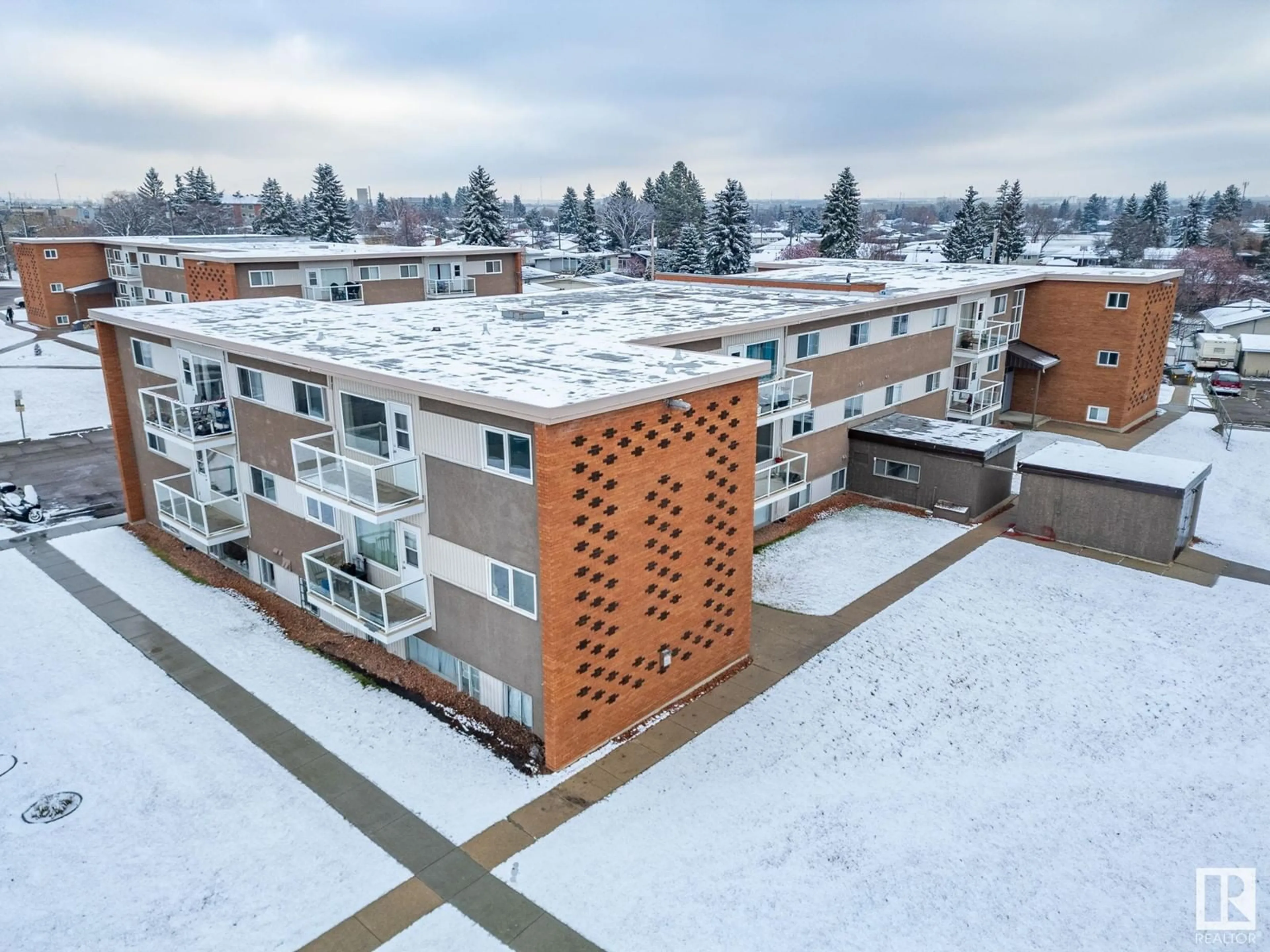 A pic from outside/outdoor area/front of a property/back of a property/a pic from drone, building for #8 6135 98 AV NW, Edmonton Alberta T6A0A3