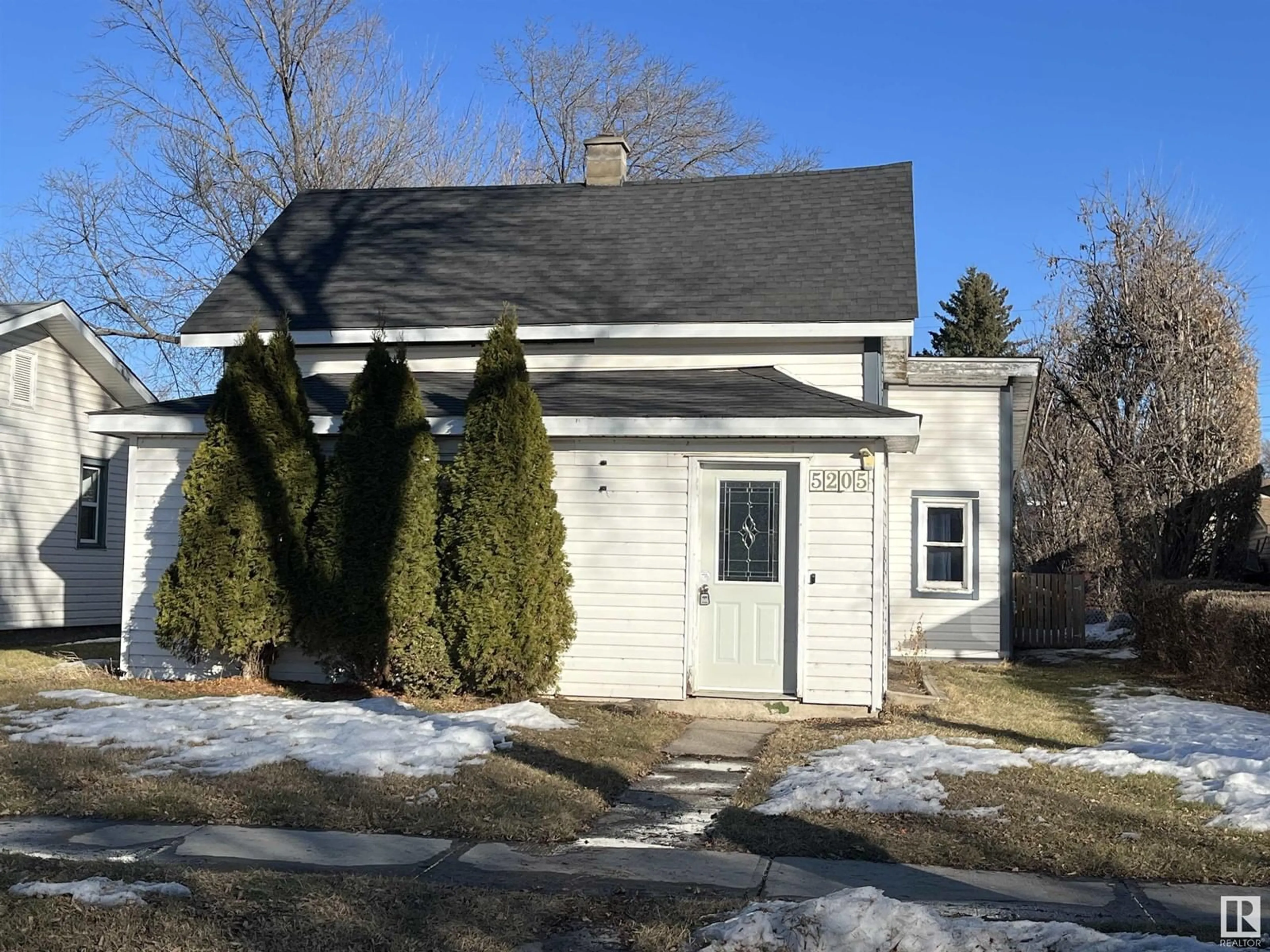 Home with vinyl exterior material, street for 5205 50 ST, Bonnyville Town Alberta T9G2G6