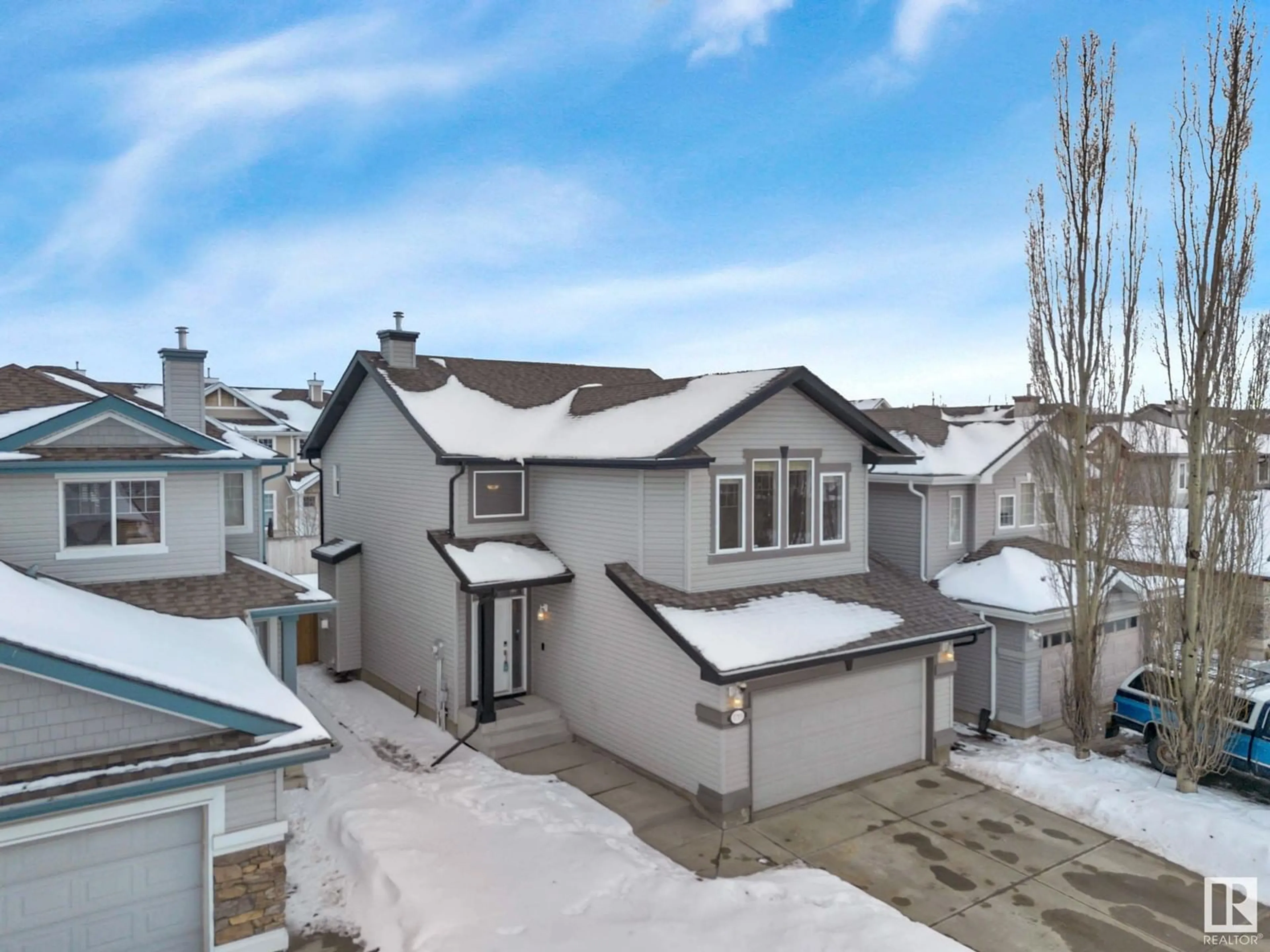 A pic from outside/outdoor area/front of a property/back of a property/a pic from drone, street for 5715 201 ST NW, Edmonton Alberta T6M0B4