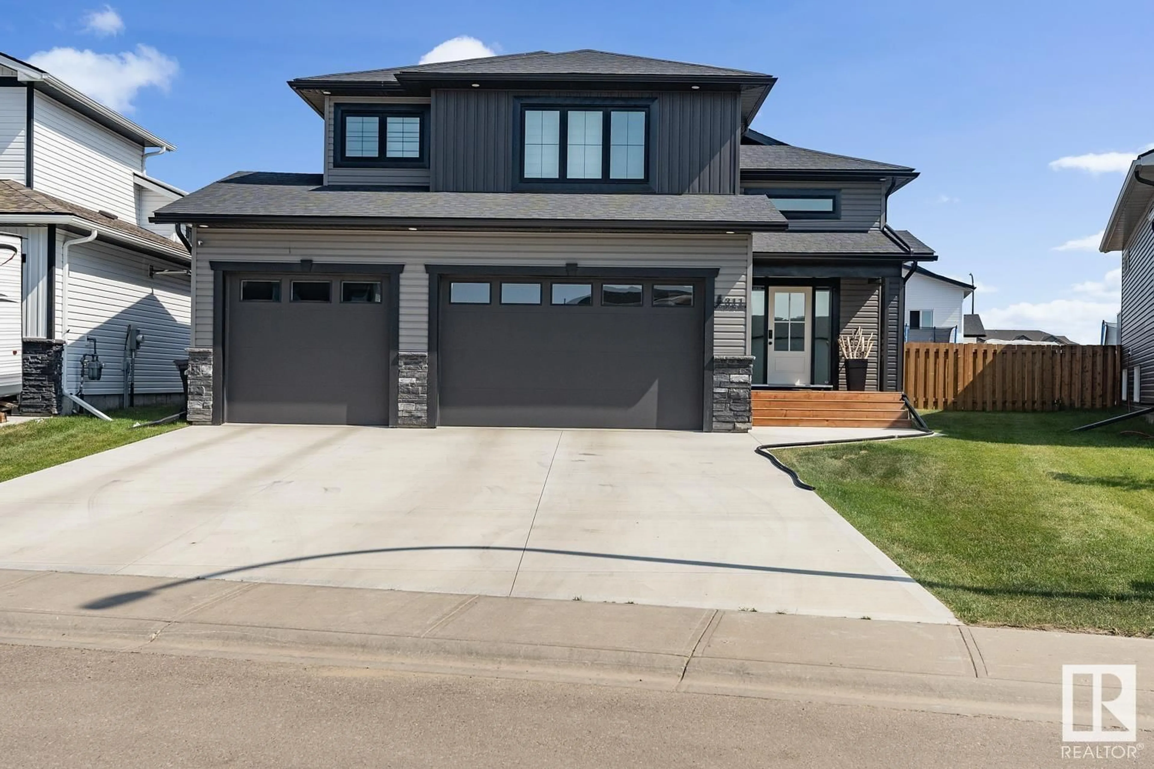 Home with vinyl exterior material, street for 805 SCHOONER DR, Cold Lake Alberta T9M0K7