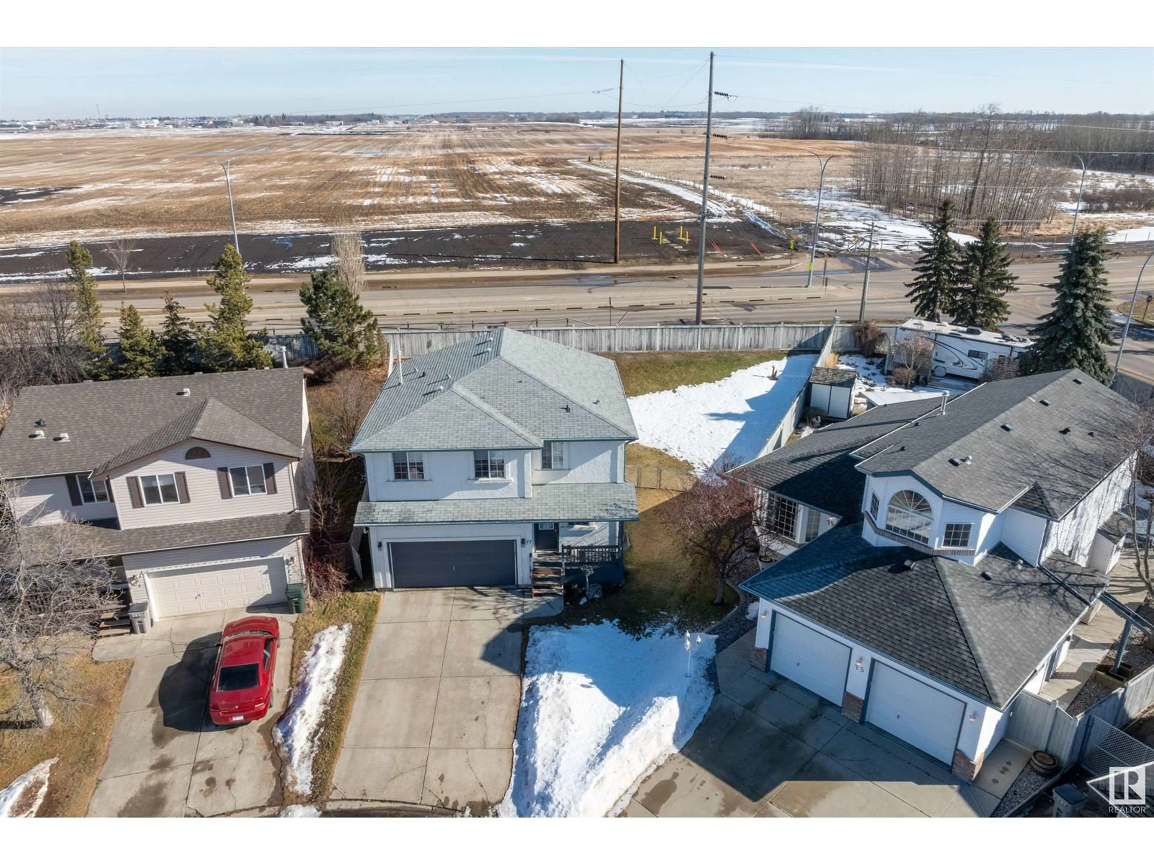 A pic from outside/outdoor area/front of a property/back of a property/a pic from drone, water/lake/river/ocean view for 73 IRONWOOD FAIRWAY CL, Stony Plain Alberta T7Z2K8