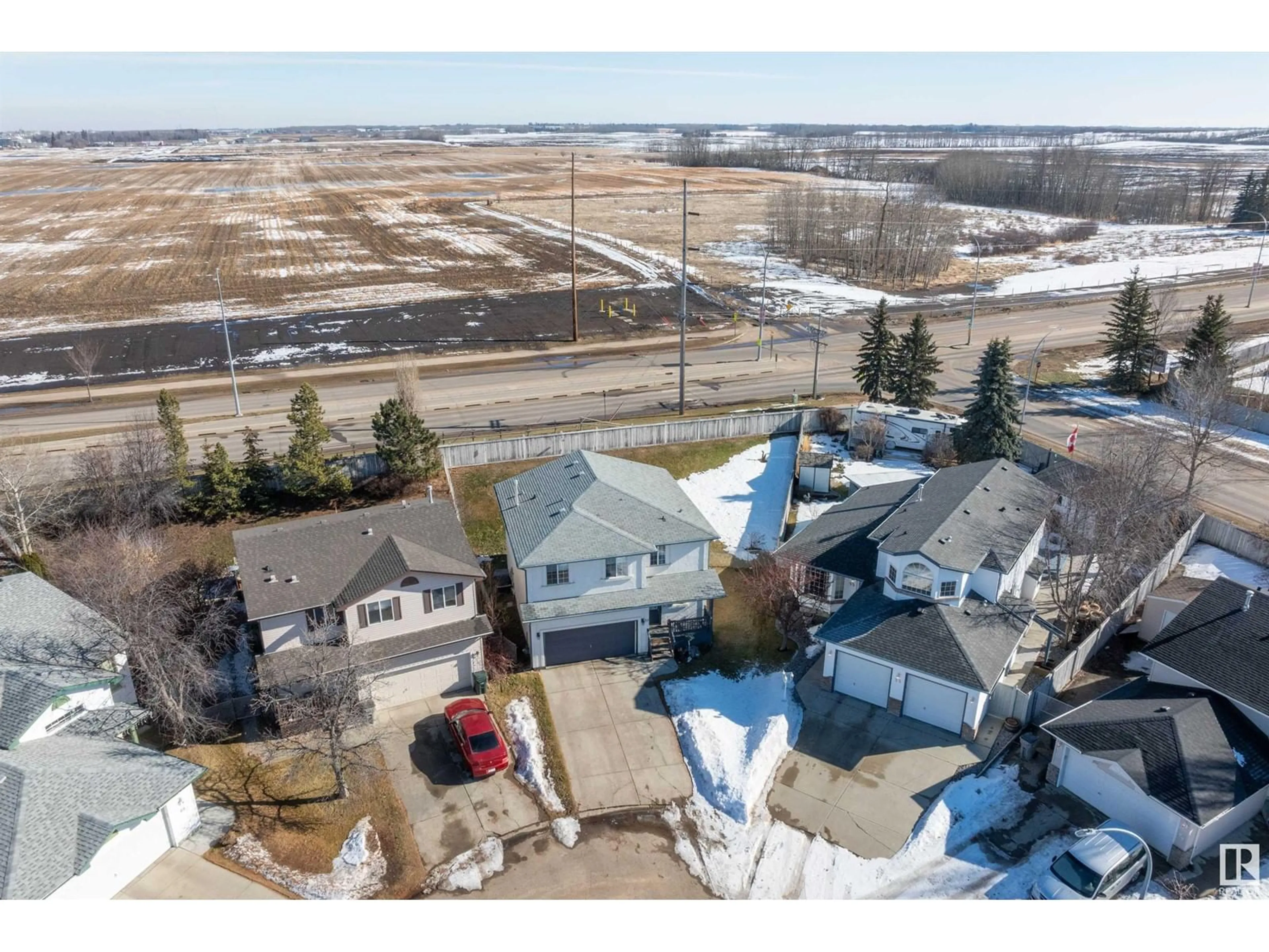 A pic from outside/outdoor area/front of a property/back of a property/a pic from drone, street for 73 IRONWOOD FAIRWAY CL, Stony Plain Alberta T7Z2K8