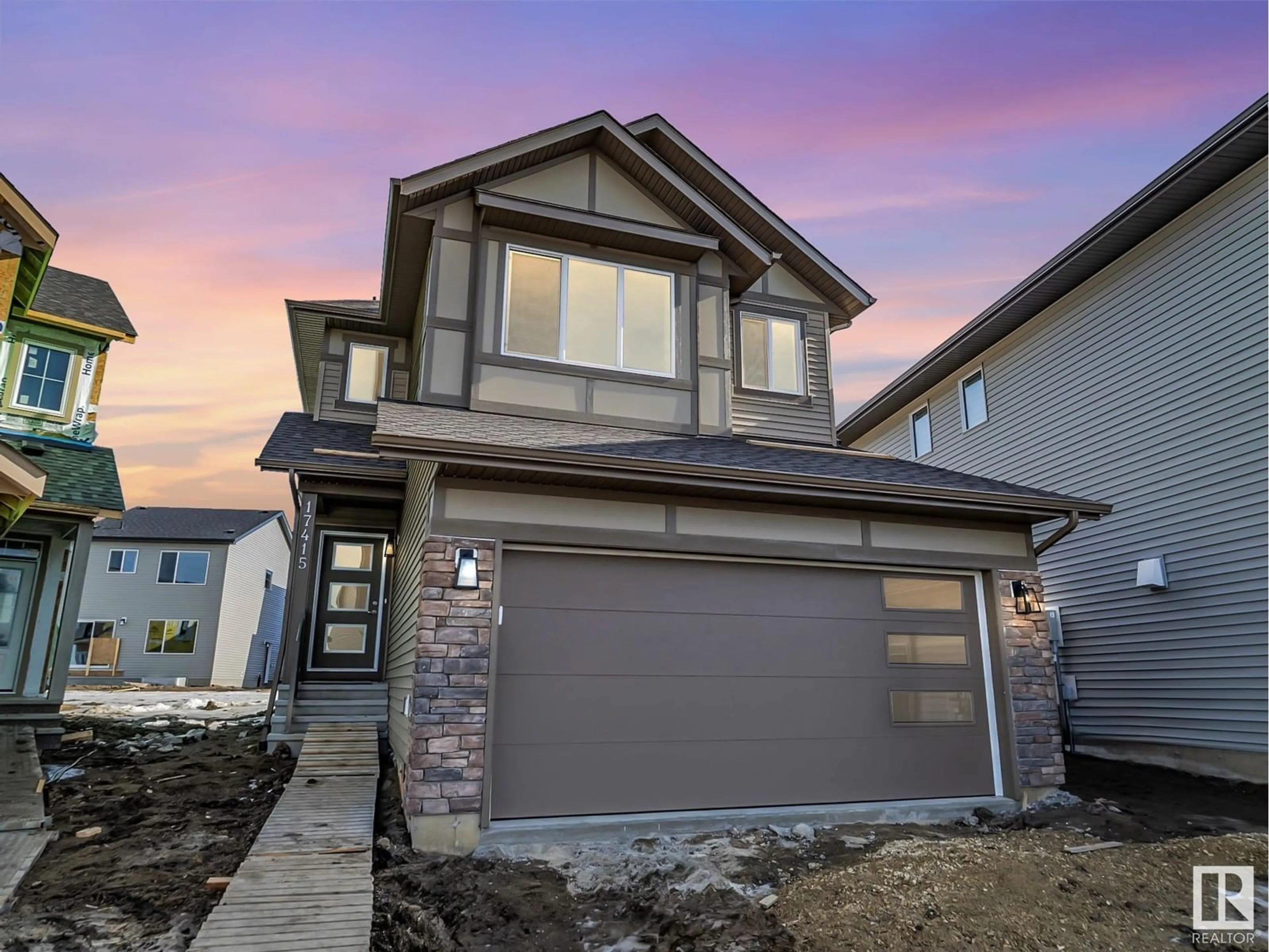 Home with vinyl exterior material, street for NW - 17415 3 ST, Edmonton Alberta T5Y4G7